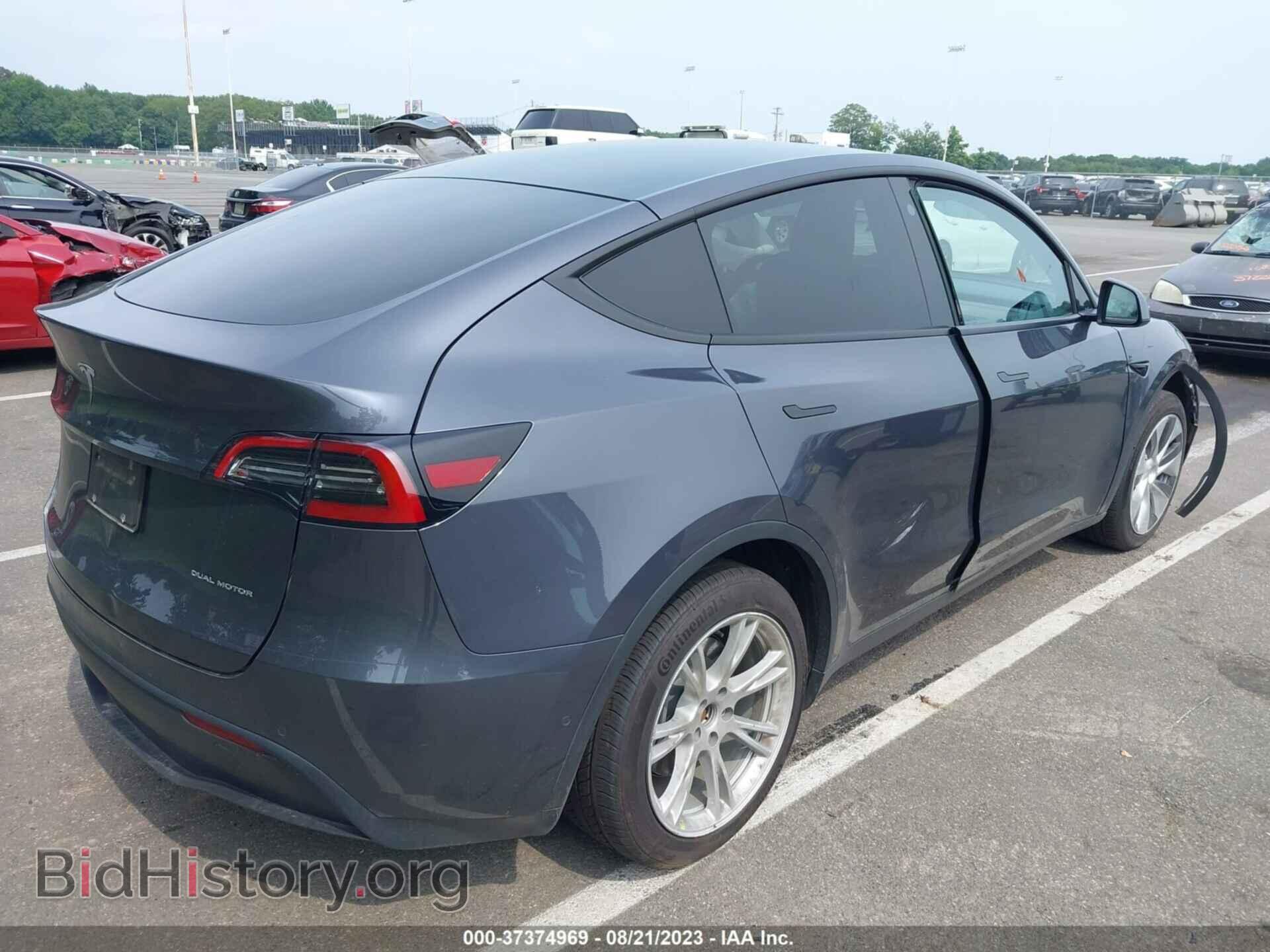 2022 TESLA MODEL Y - VIN: 7SAYGAEE9NF339313 - Photo 4