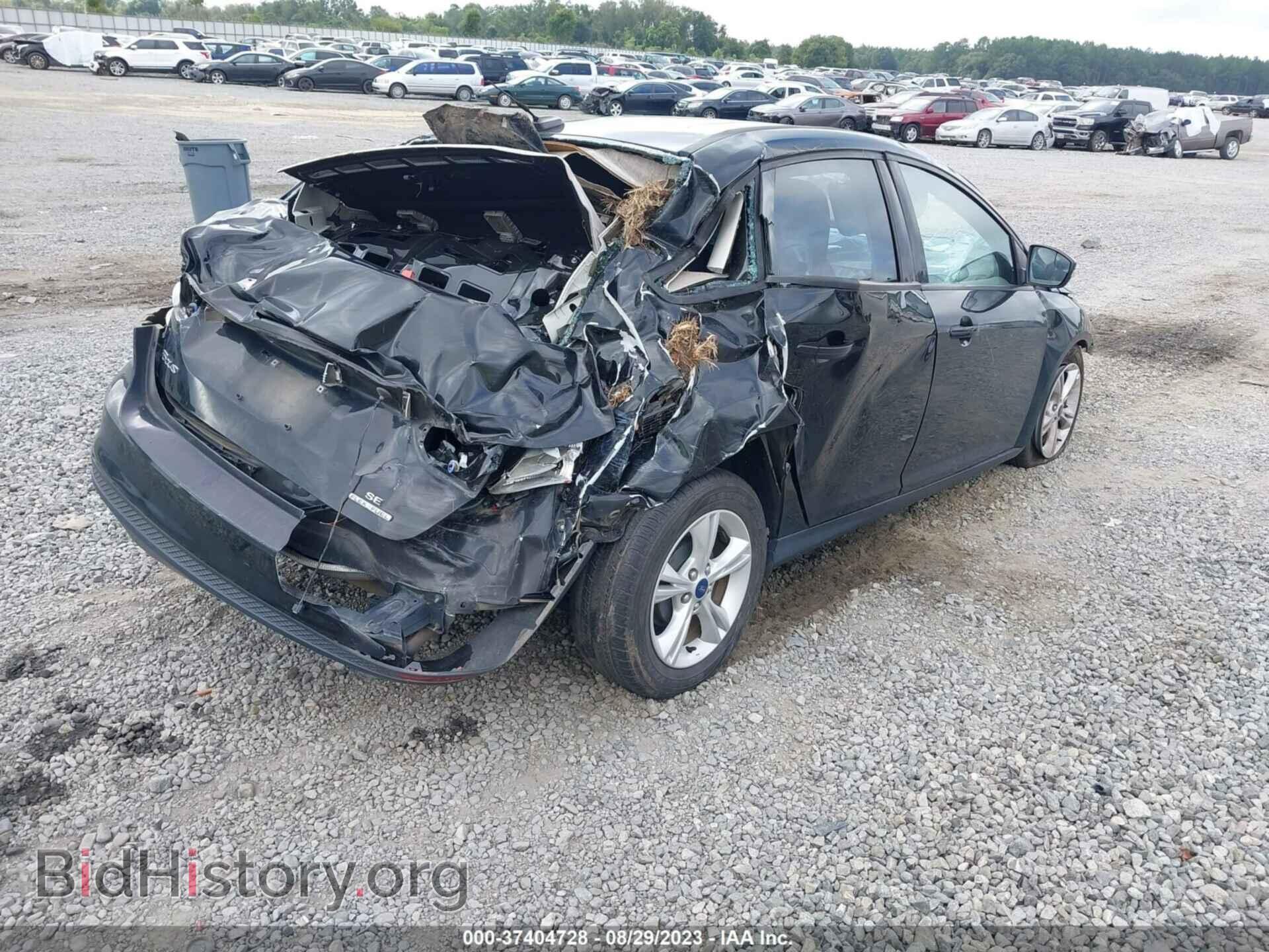 2014 FORD FOCUS - VIN: 1FADP3F2XEL402868 - Photo 4