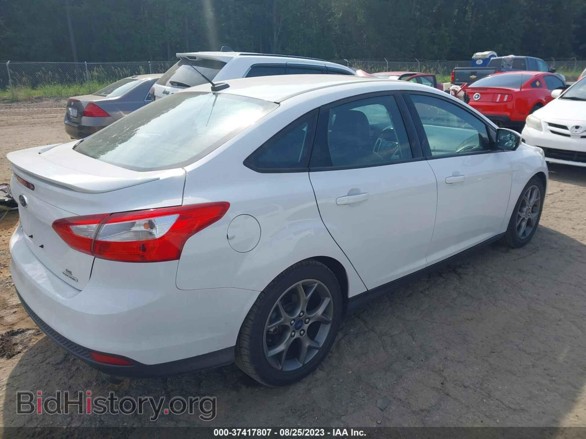 2014 FORD FOCUS - VIN: 1FADP3F2XEL443551 - Photo 4