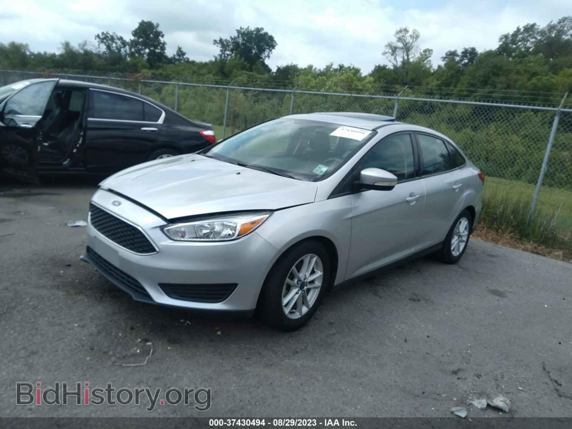 2016 FORD FOCUS - VIN: 1FADP3F21GL216848 - Фото 2