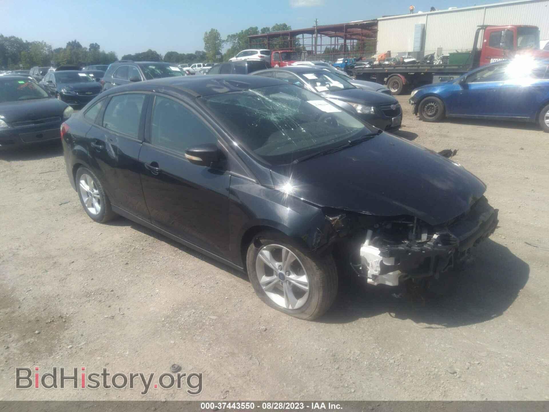 Фотография 1FADP3F26EL439125 - FORD FOCUS 2014