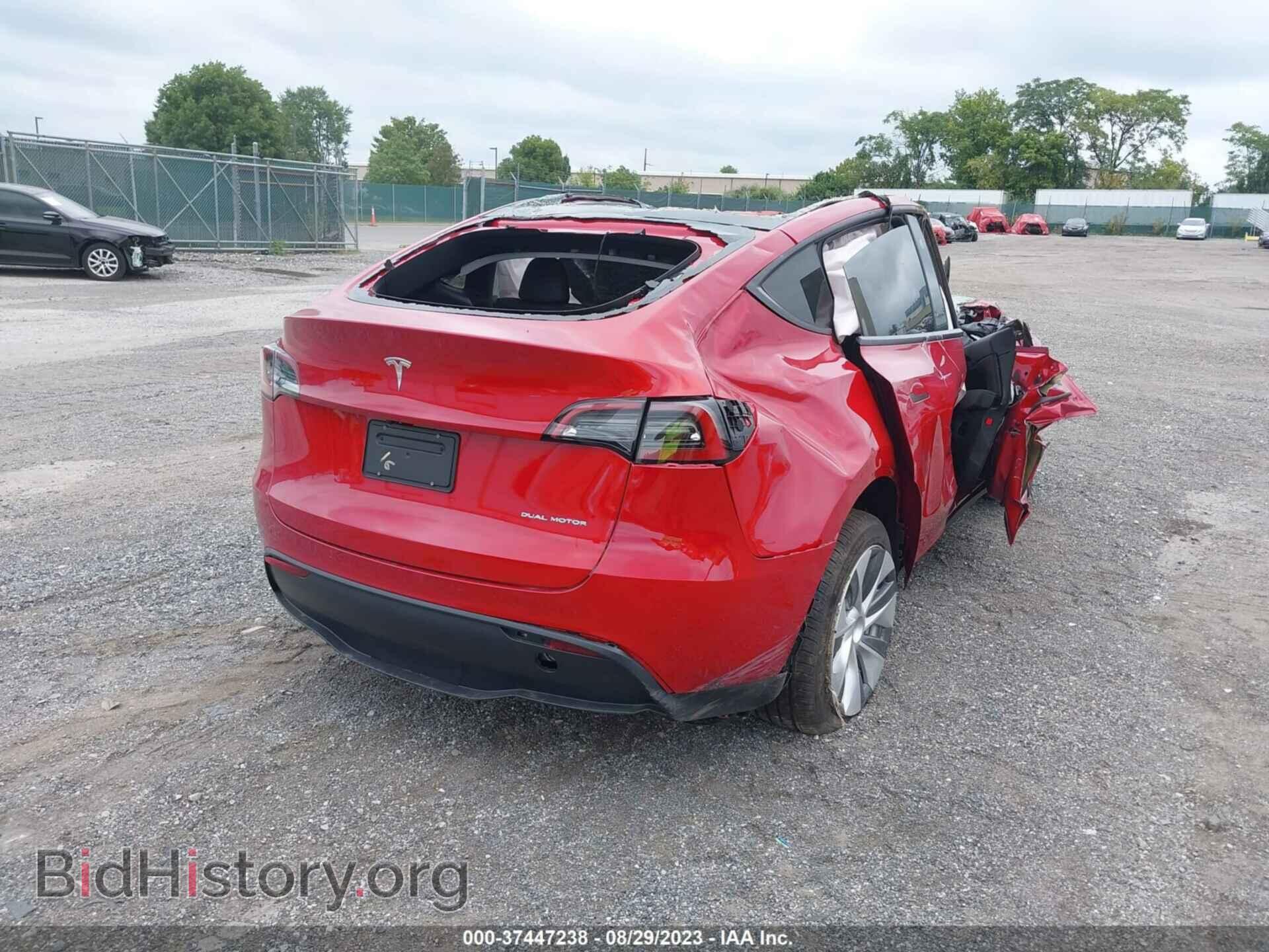 2023 TESLA MODEL Y - VIN: 7SAYGDEE6PF845217 - Photo 4