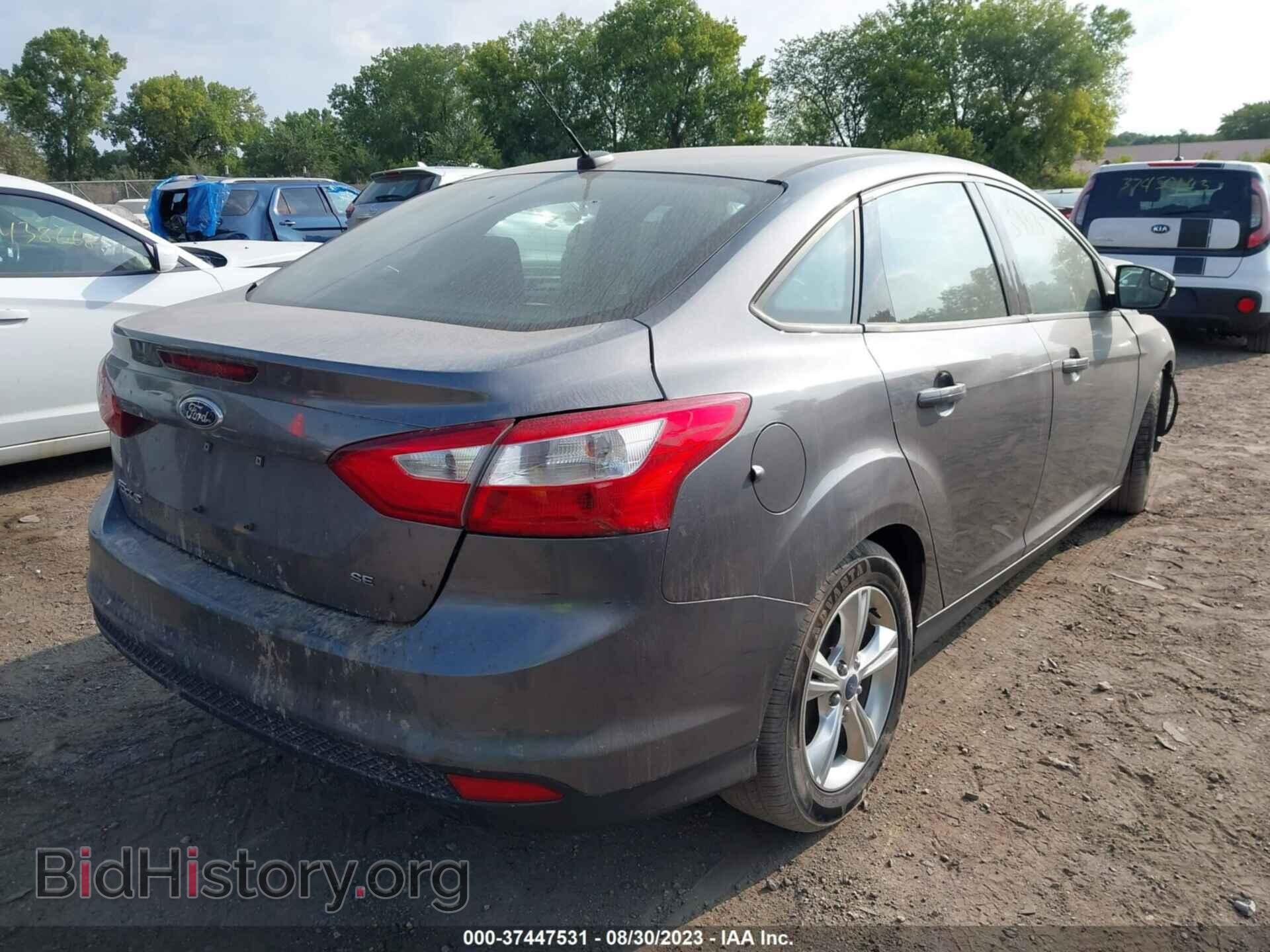 2014 FORD FOCUS - VIN: 1FADP3F20EL231502 - Photo 4