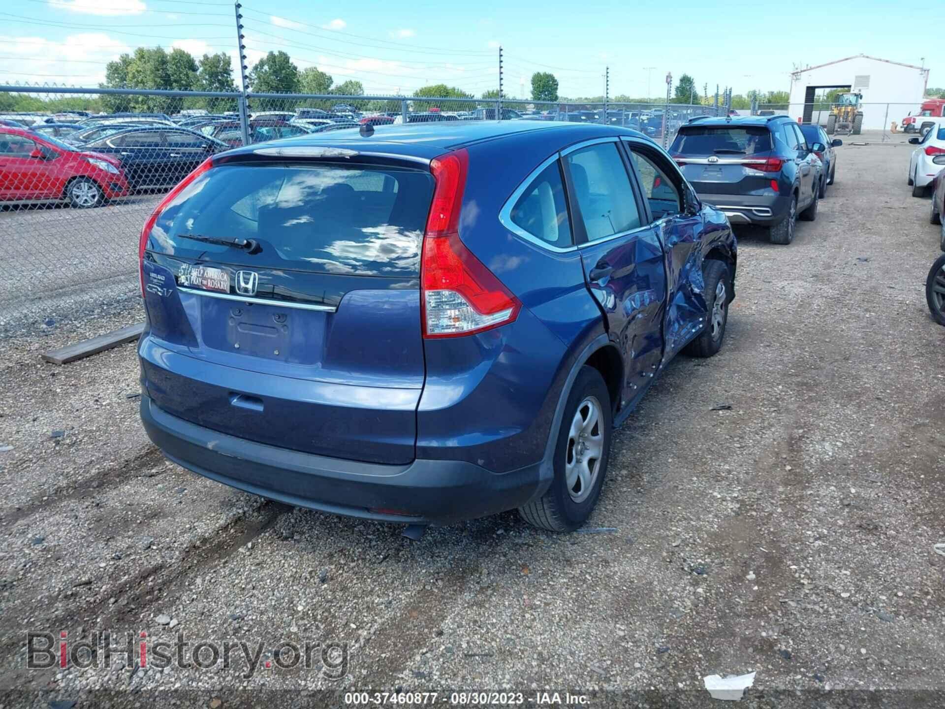 2014 HONDA CR-V - VIN: 3CZRM3H32EG709506 - Фото 4