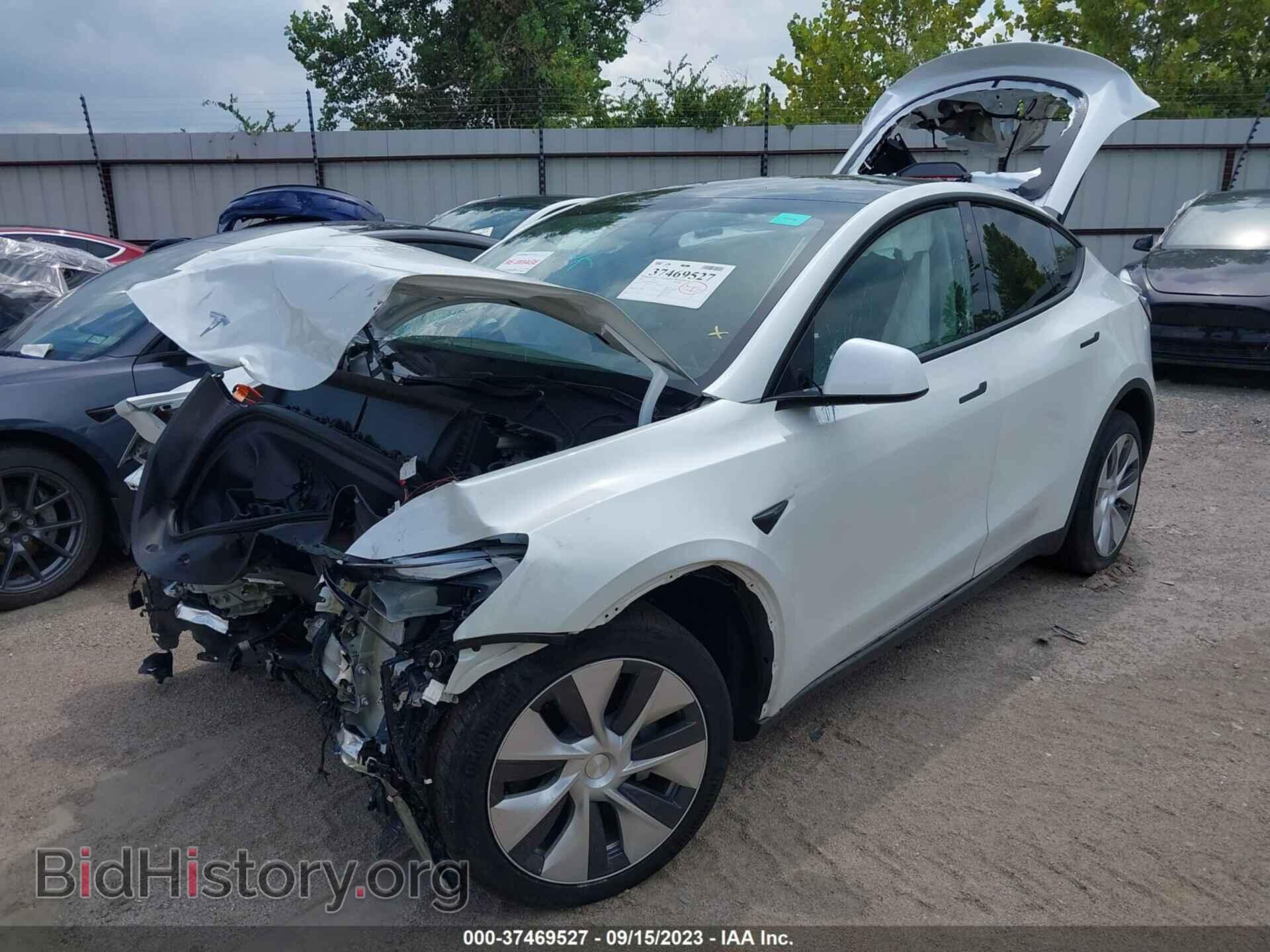2023 TESLA MODEL Y - VIN: 7SAYGDEE8PF710918 - Фото 2