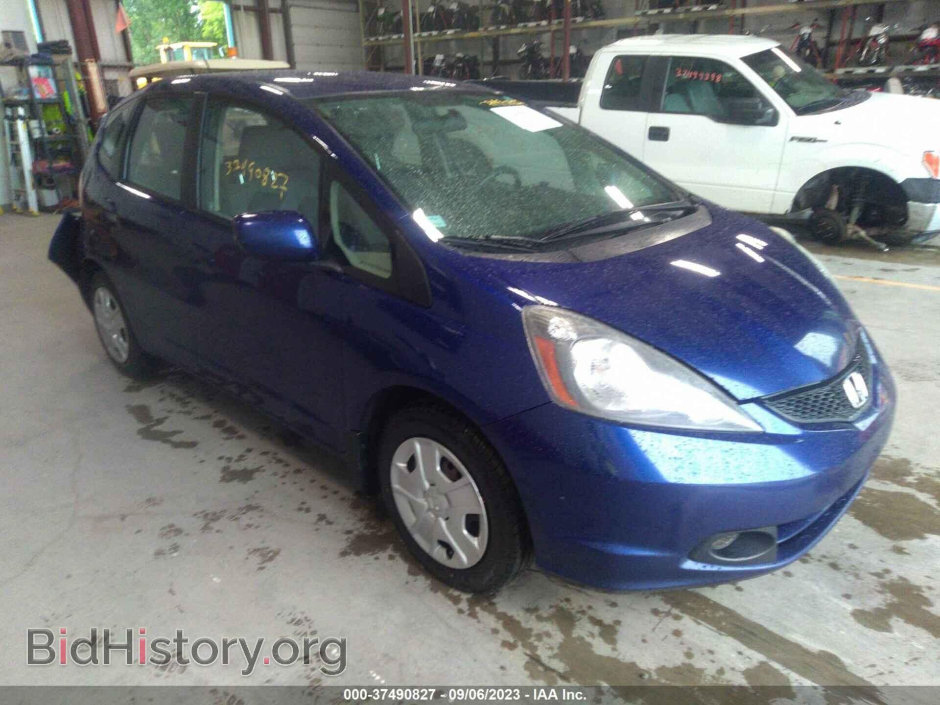 Фотография JHMGE8H32CC014335 - HONDA FIT 2012