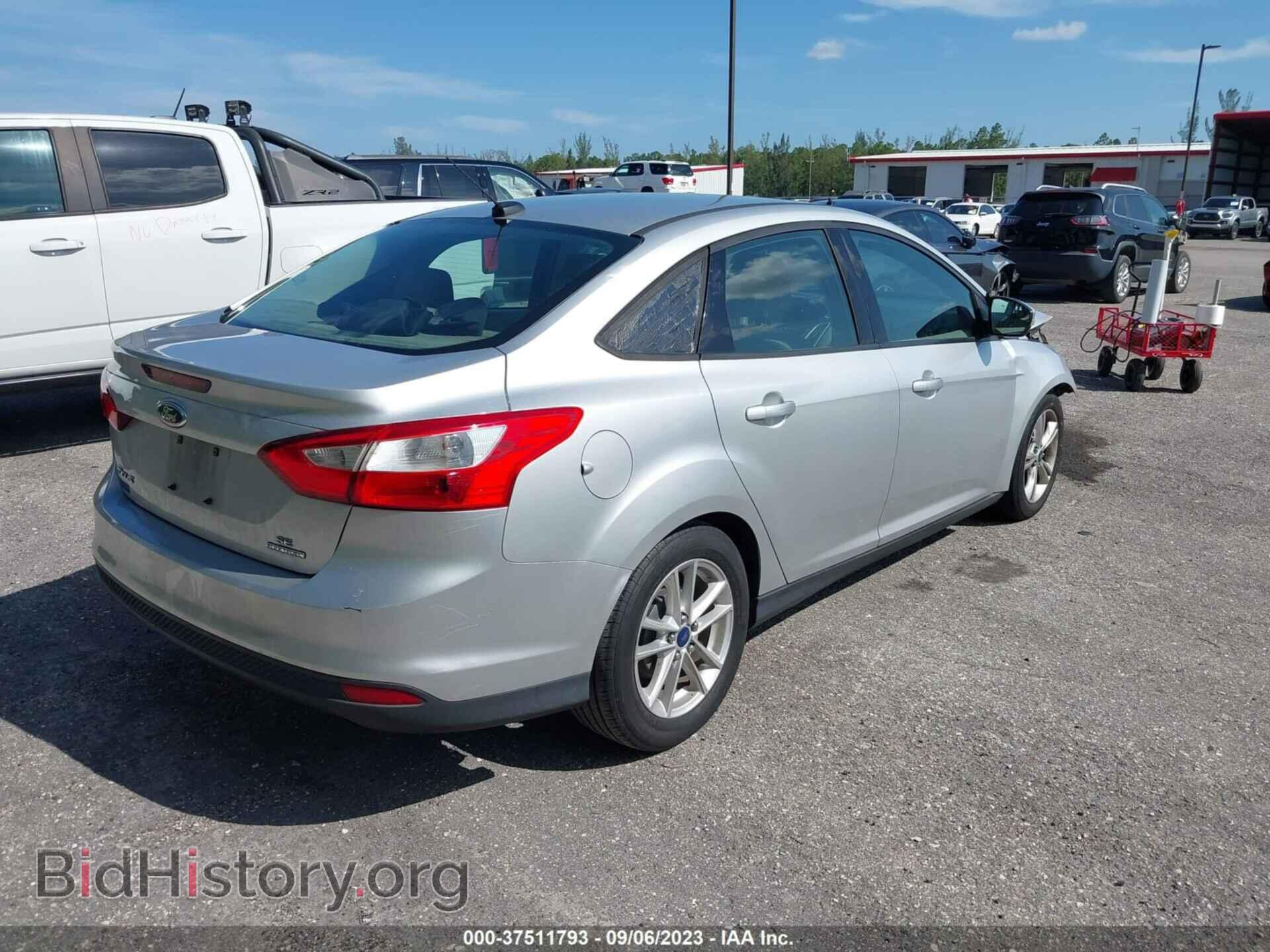2014 FORD FOCUS - VIN: 1FADP3F25EL251938 - Photo 4