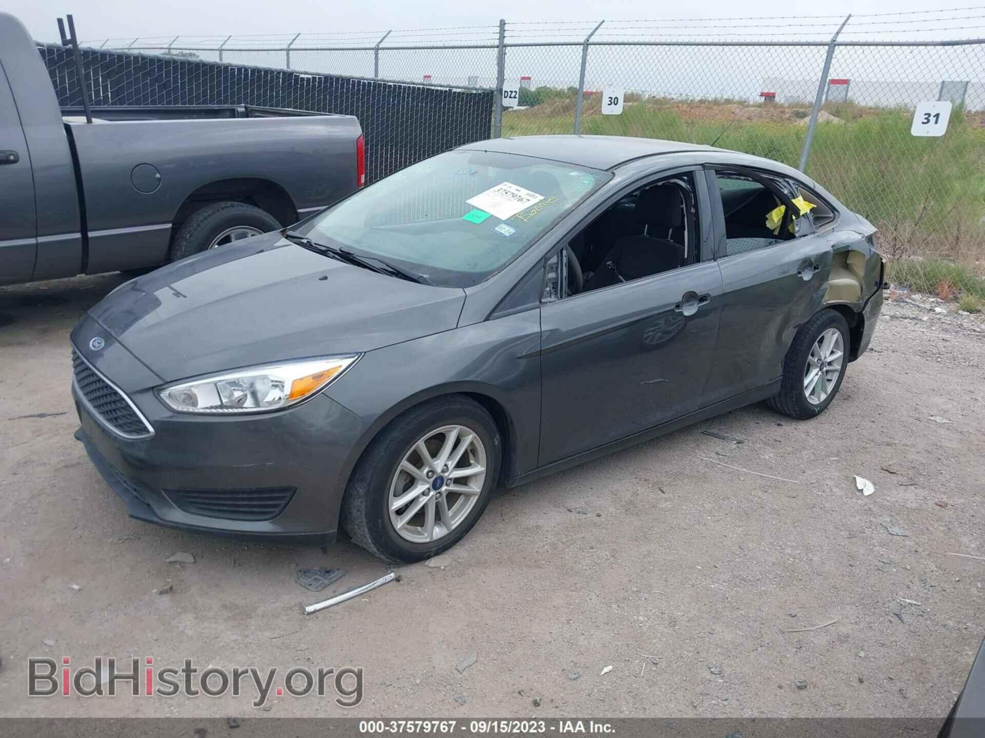 2016 FORD FOCUS - VIN: 1FADP3F29GL402122 - Фото 2