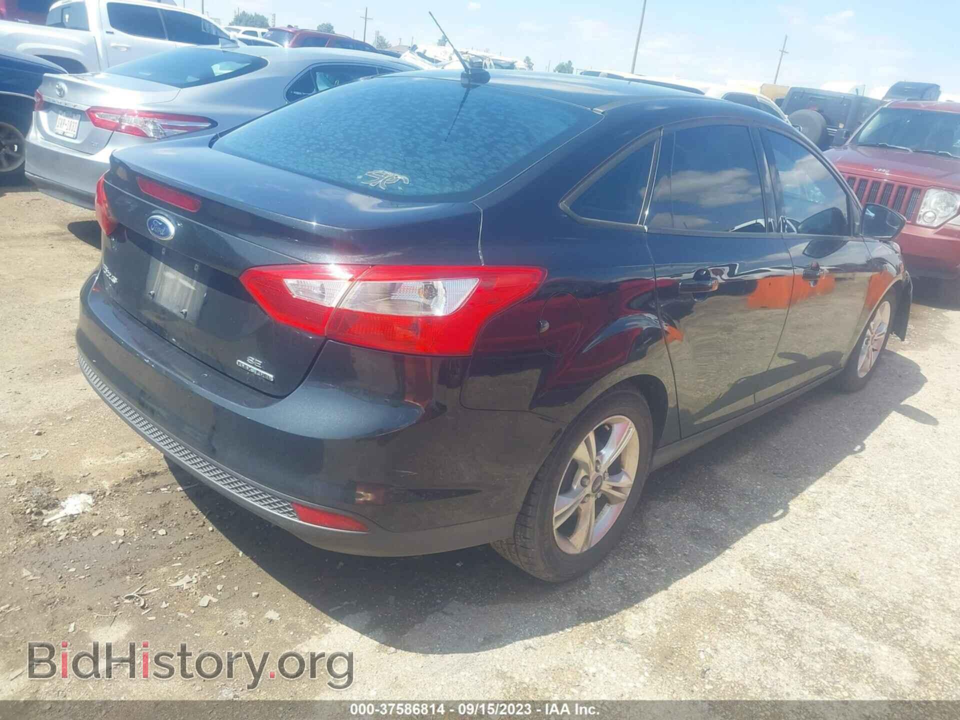 2014 FORD FOCUS - VIN: 1FADP3F22EL109210 - Photo 4