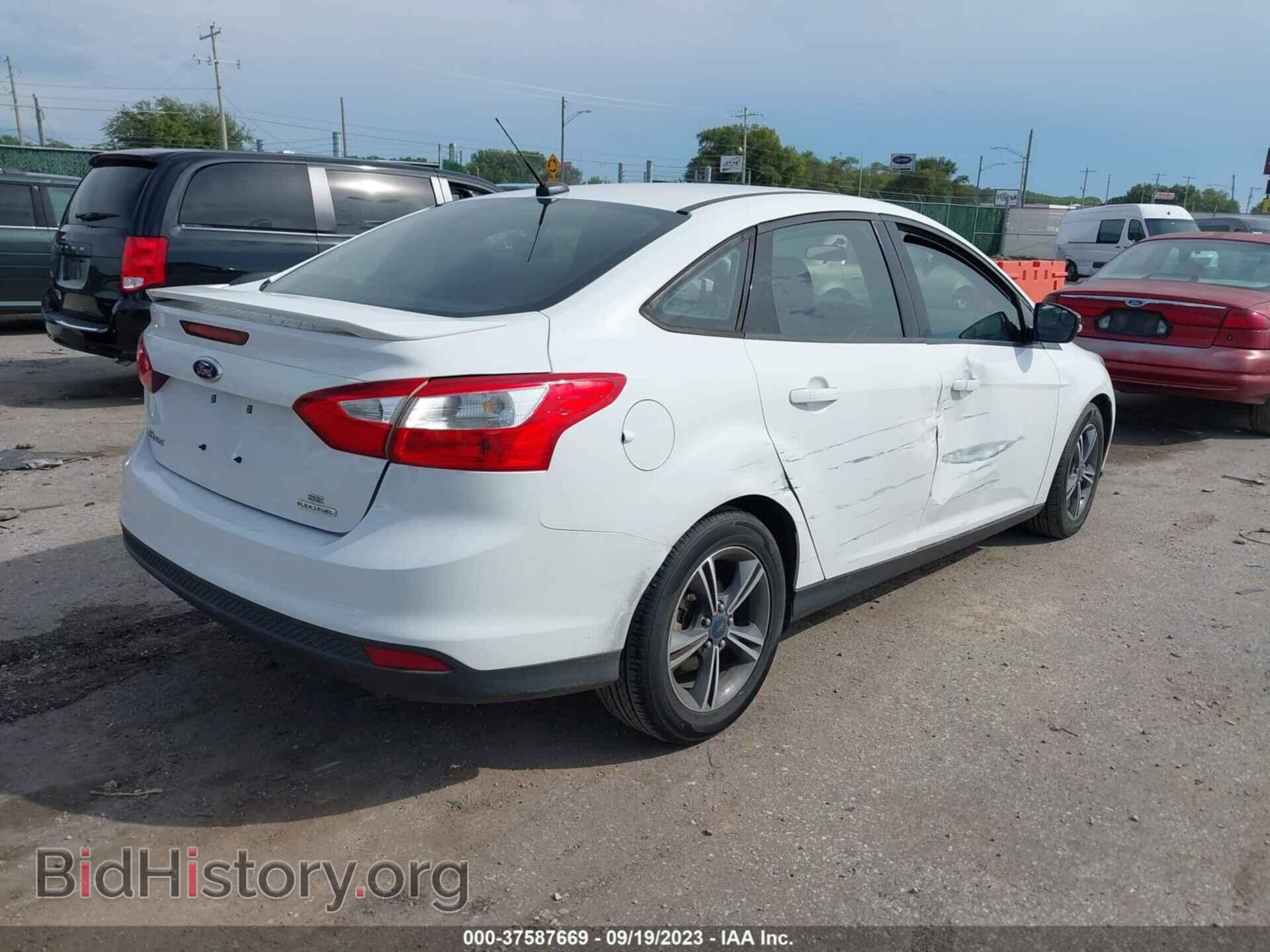 2014 FORD FOCUS - VIN: 1FADP3F28EL373015 - Photo 4