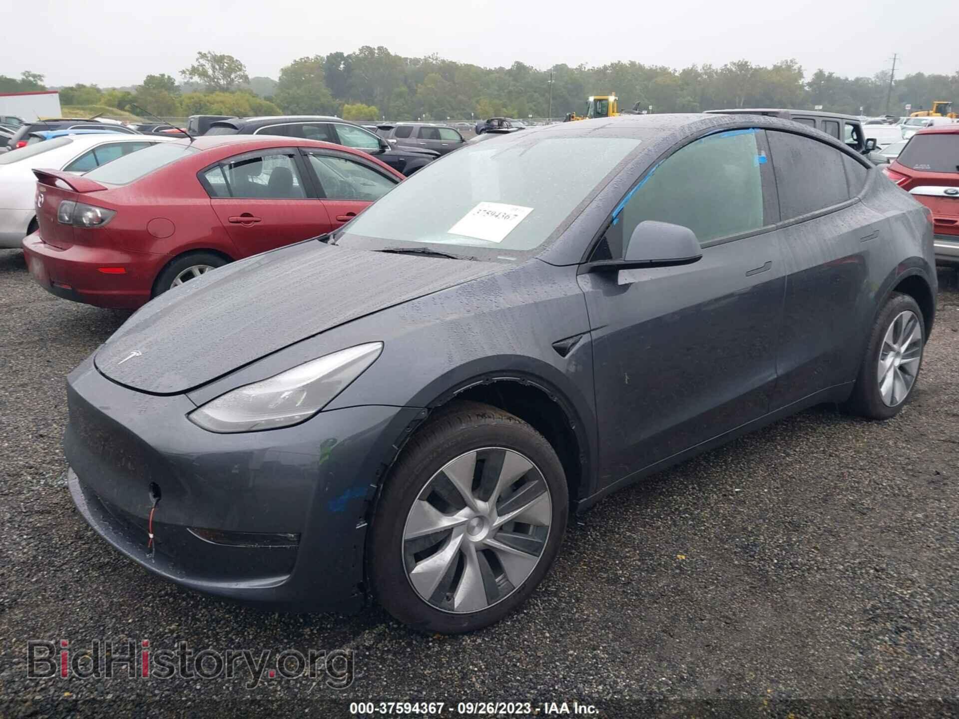 2023 TESLA MODEL Y - VIN: 7SAYGAEE2PF834360 - Фото 2