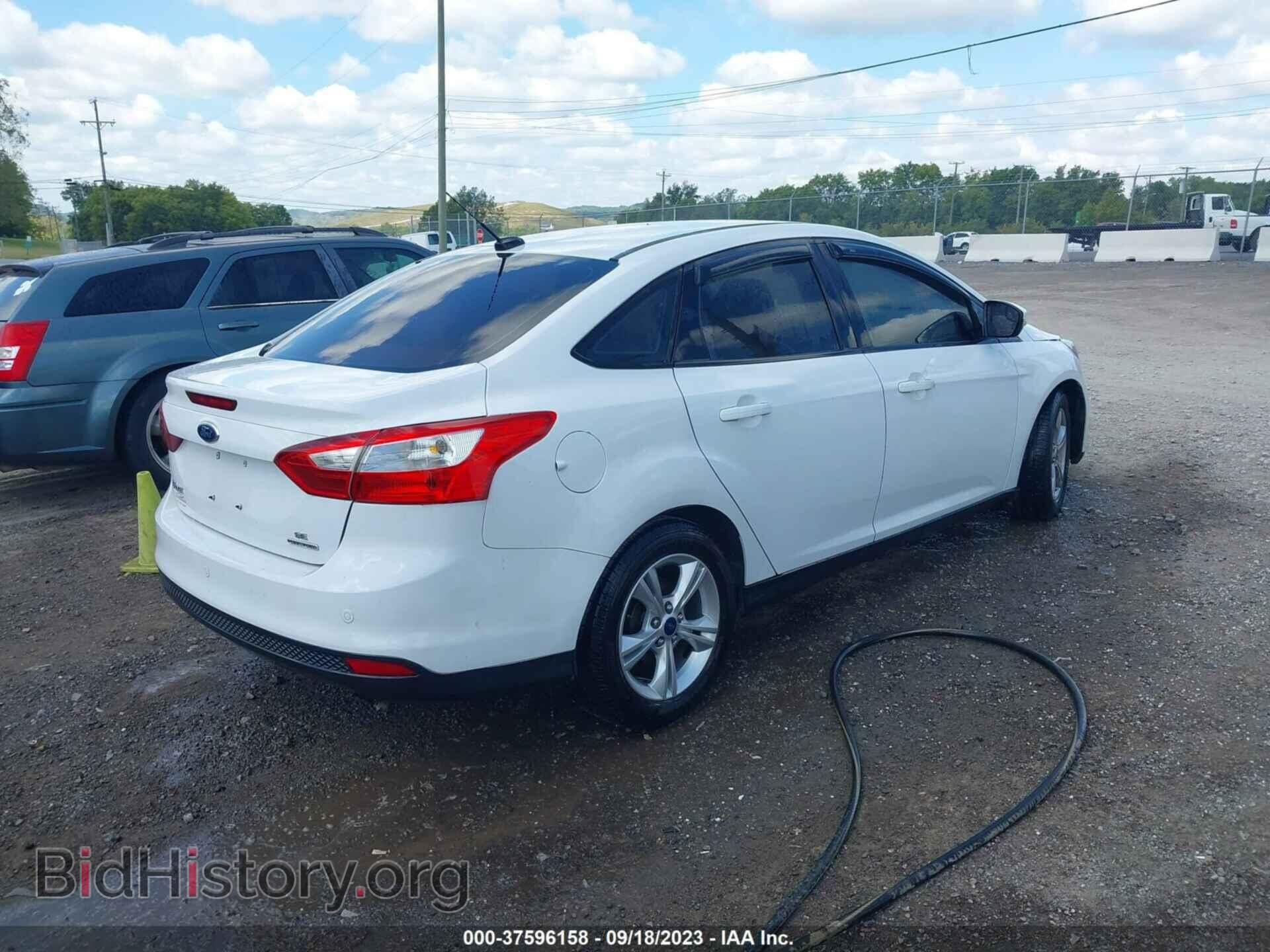 2014 FORD FOCUS - VIN: 1FADP3F2XEL347600 - Photo 4