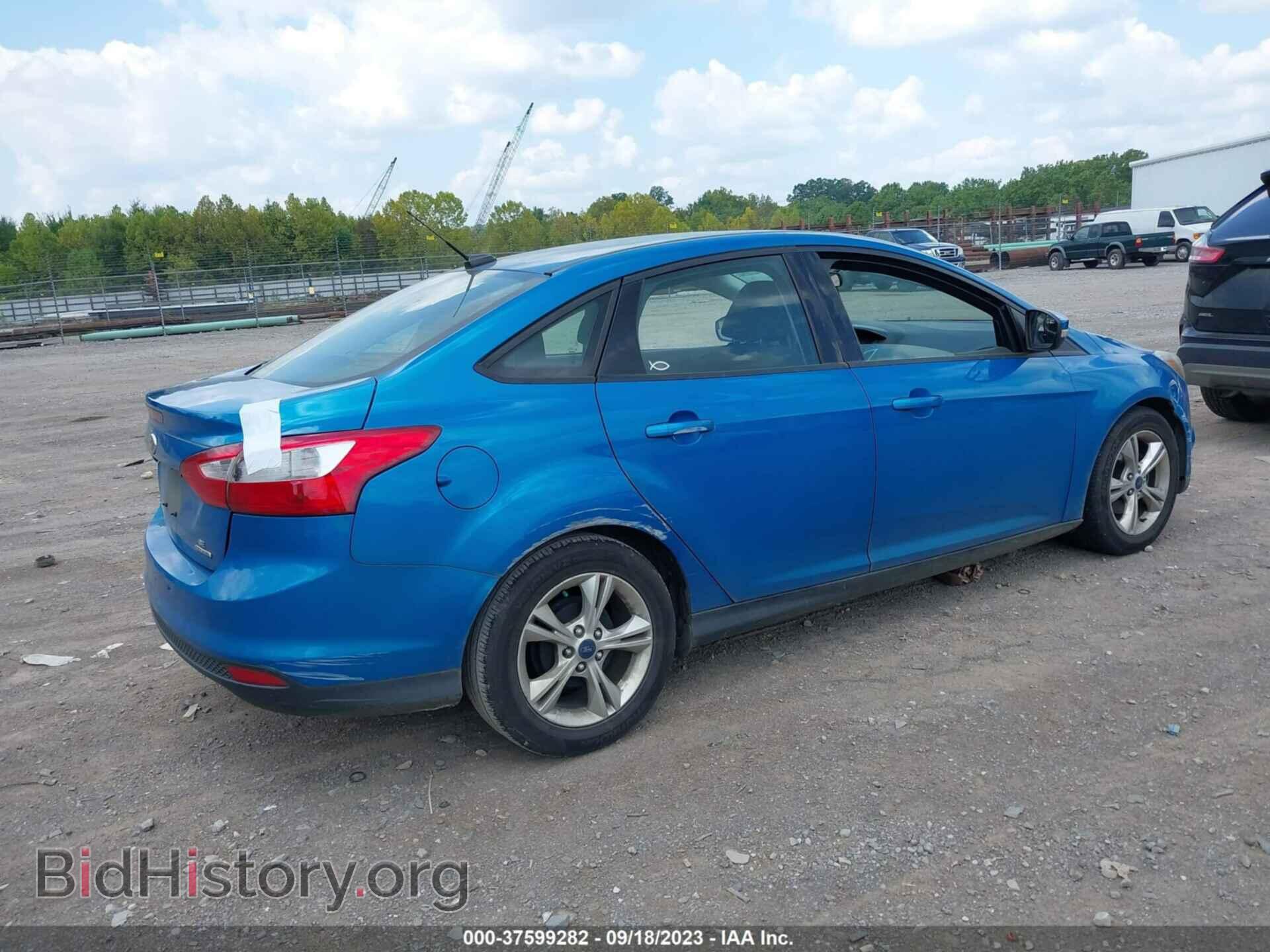 2014 FORD FOCUS - VIN: 1FADP3F23EL232997 - Photo 4