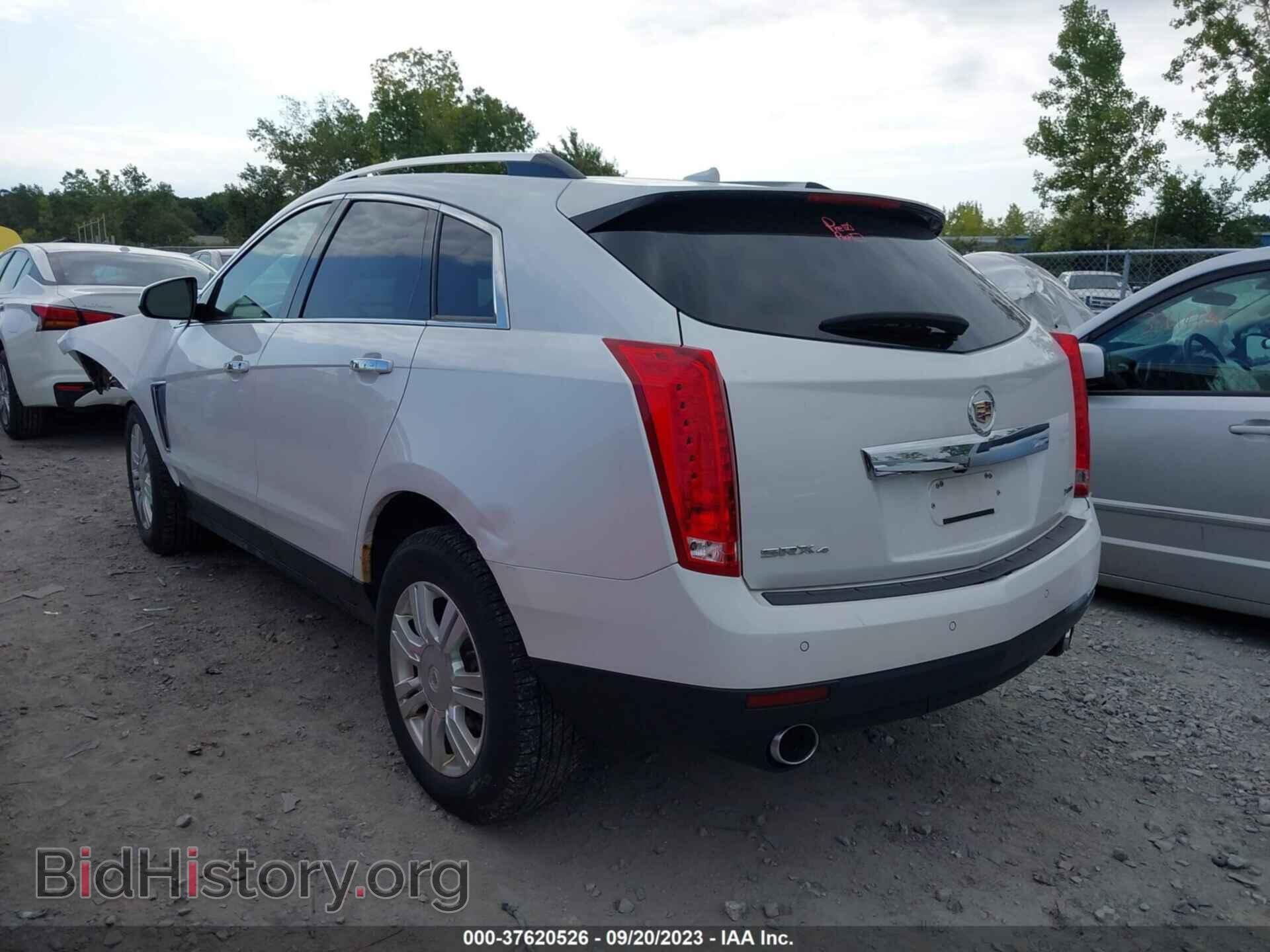 2014 CADILLAC SRX - VIN: 3GYFNEE33ES525656 - Фото 3