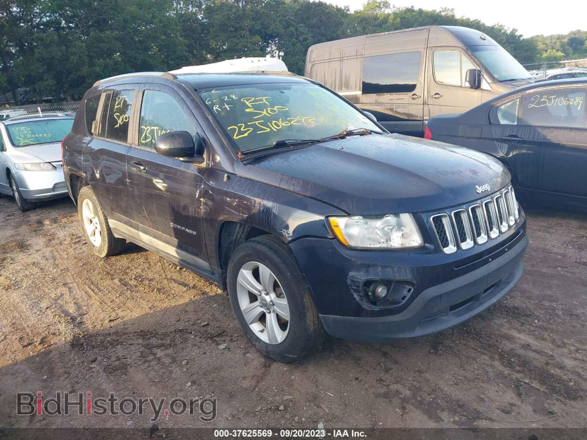 Photo 1J4NF1FB8BD134571 - JEEP COMPASS 2011