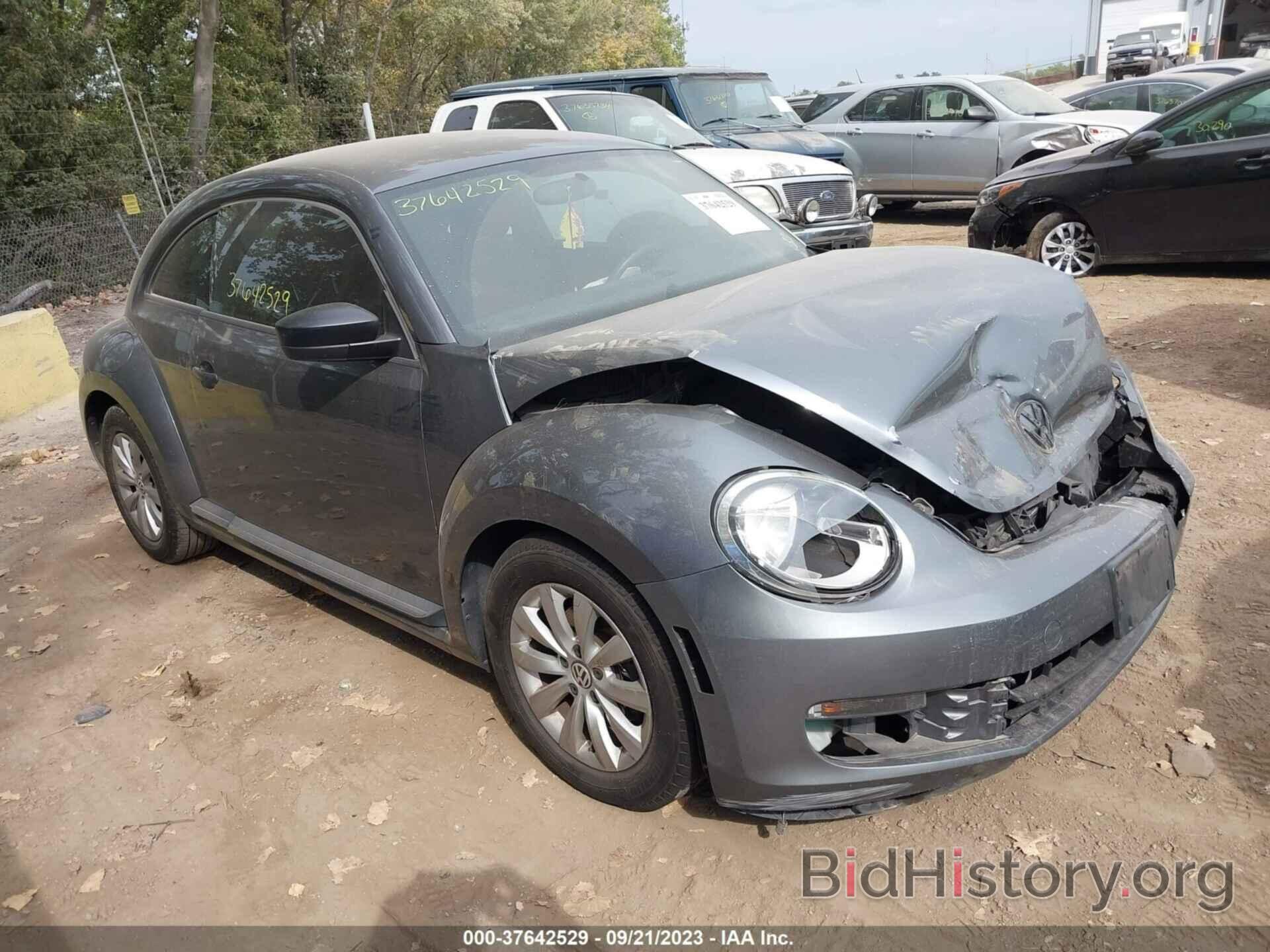 Photo 3VWFP7ATXEM606690 - VOLKSWAGEN BEETLE COUPE 2014