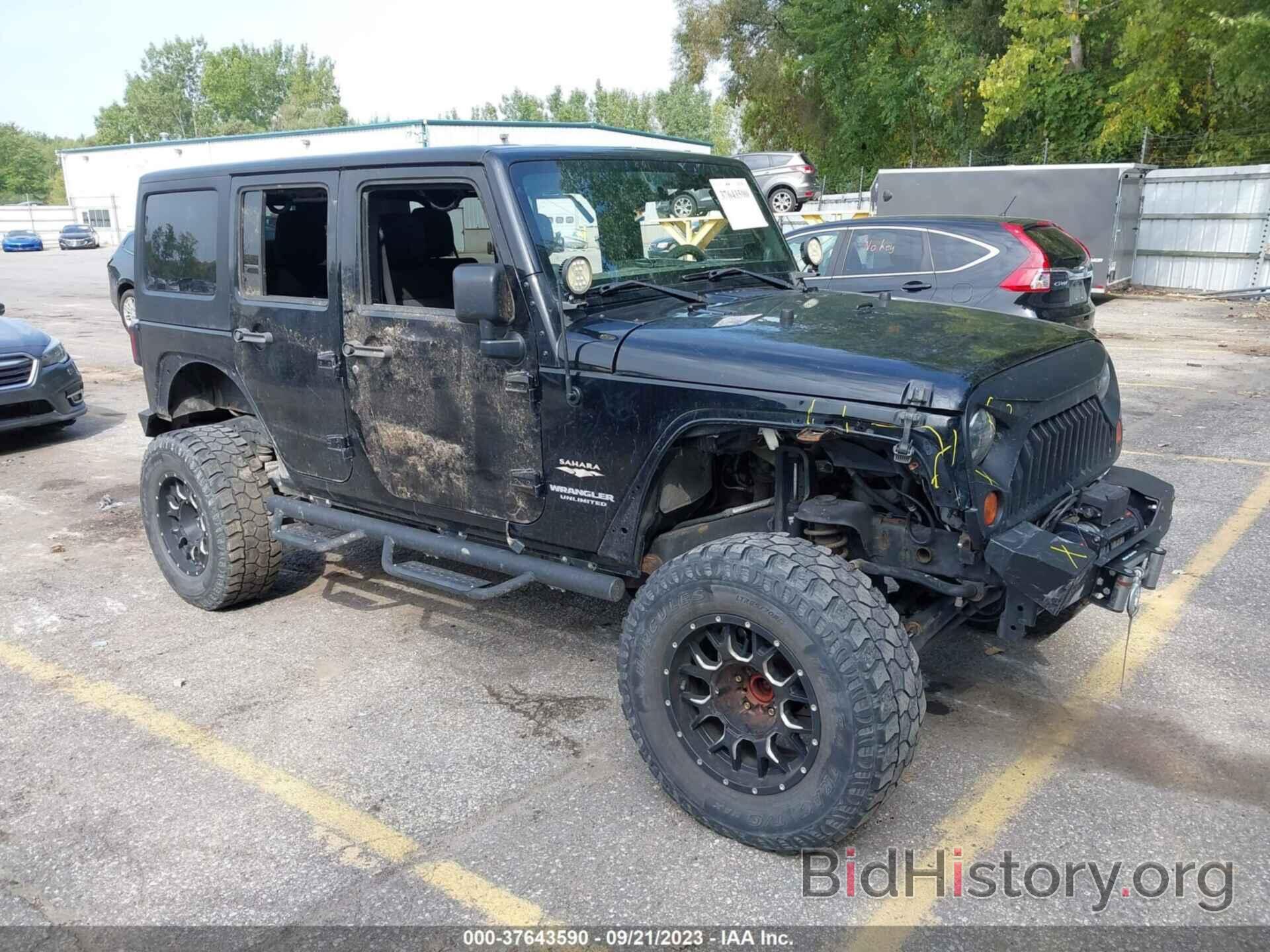 Photo 1J4BA5H13BL588956 - JEEP WRANGLER UNLIMITED 2011