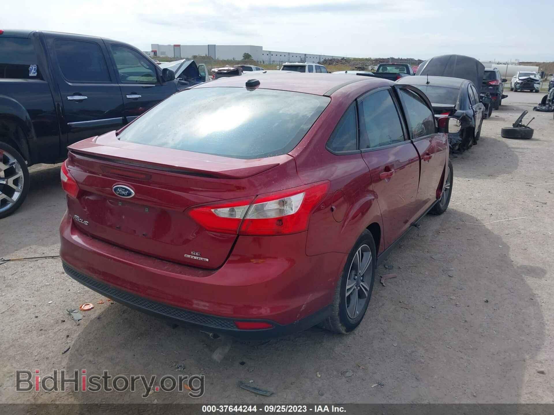 2014 FORD FOCUS - VIN: 1FADP3F2XEL183765 - Photo 4