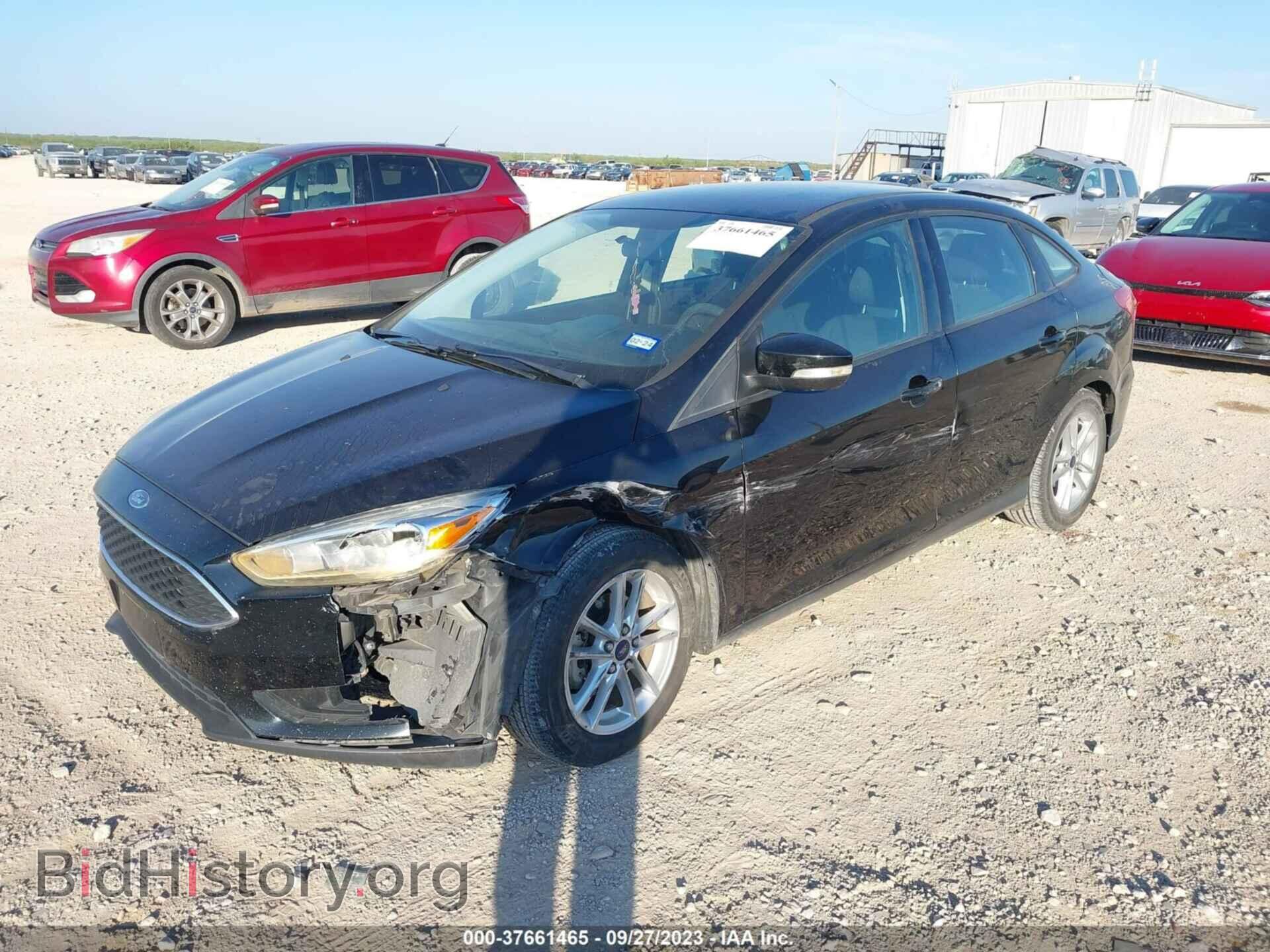 2016 FORD FOCUS - VIN: 1FADP3F21GL271249 - Фото 2