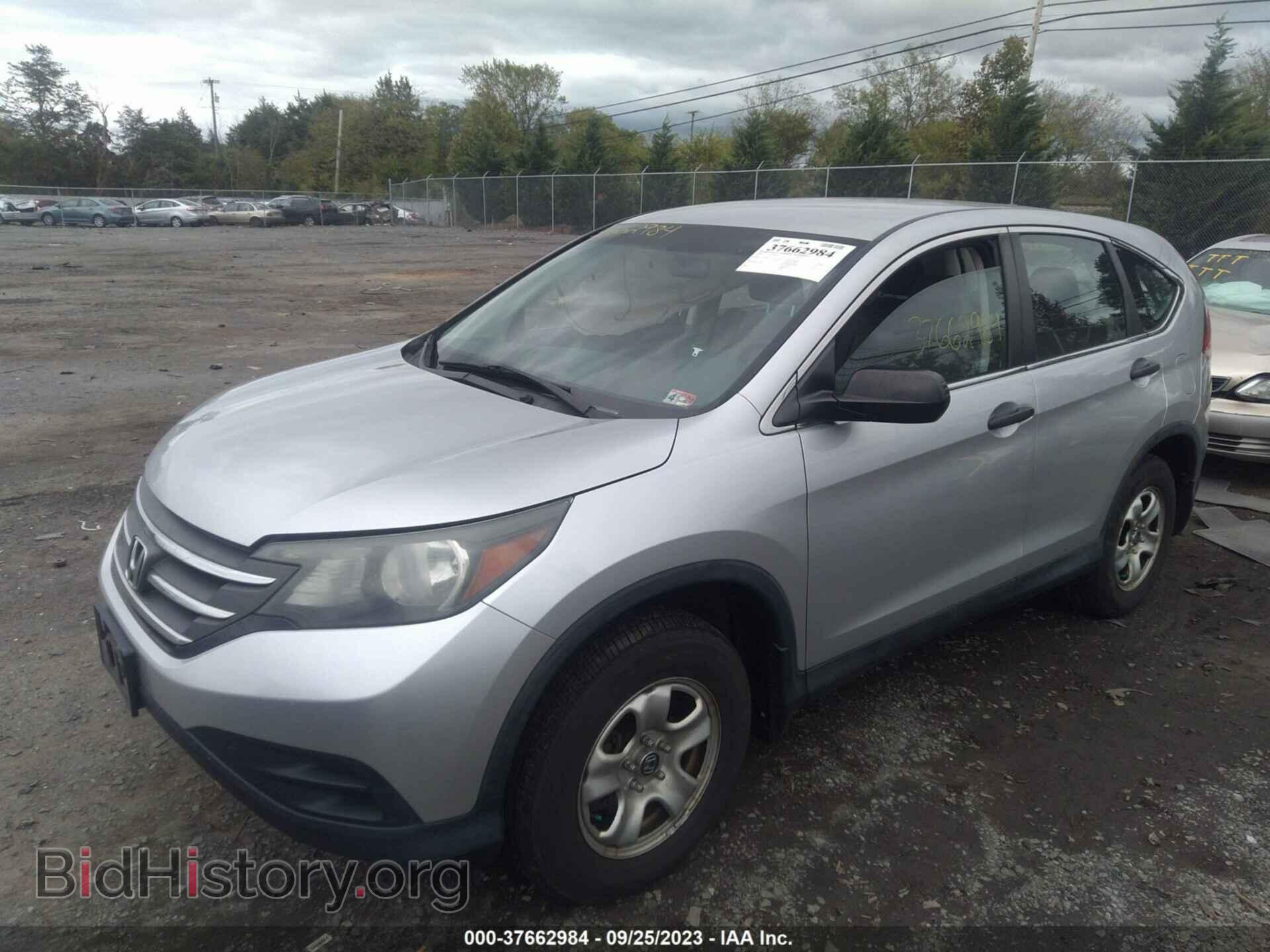 2014 HONDA CR-V - VIN: 2HKRM4H39EH658640 - Фото 2