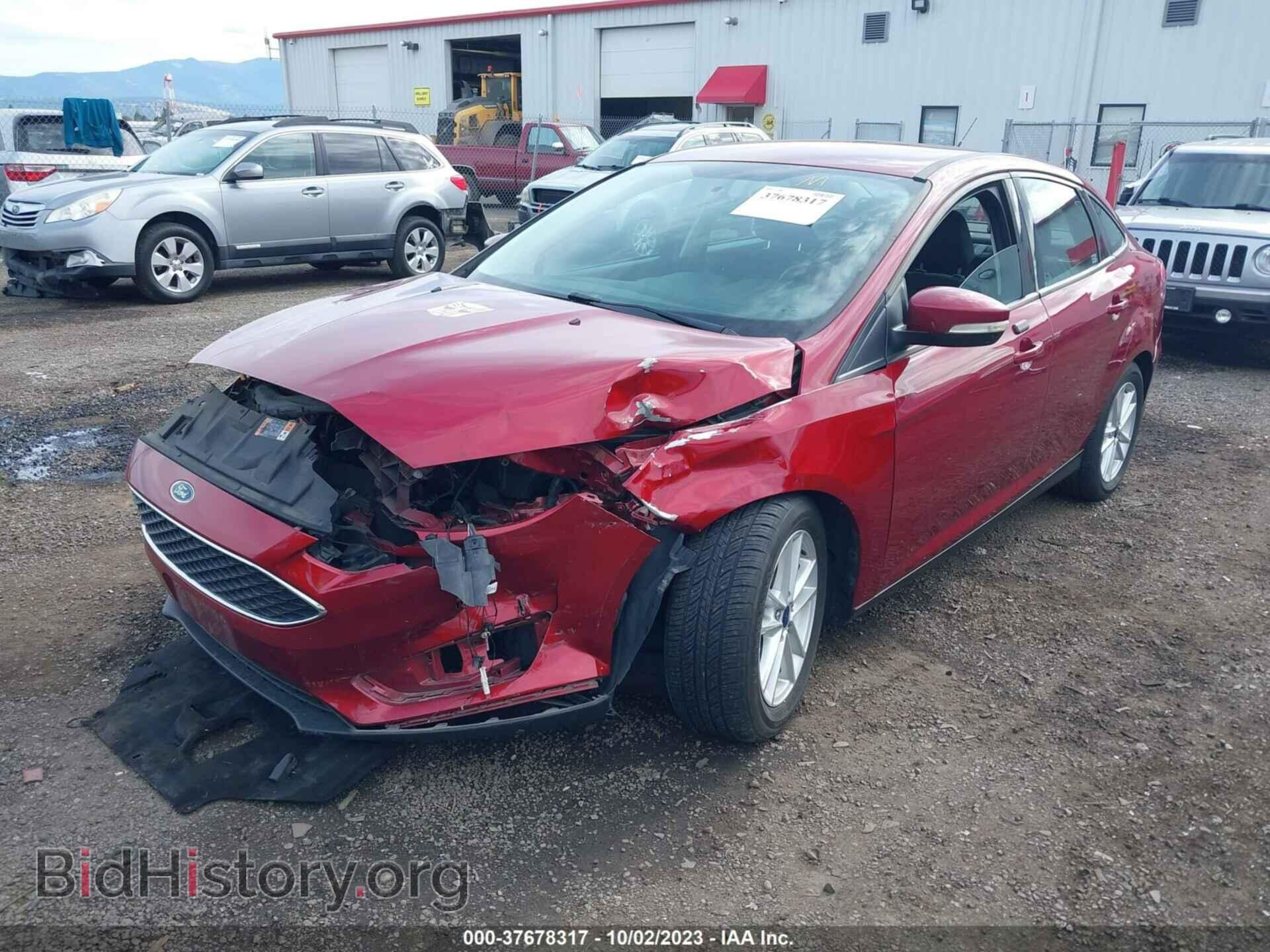 2016 FORD FOCUS - VIN: 1FADP3F24GL282858 - Фото 2