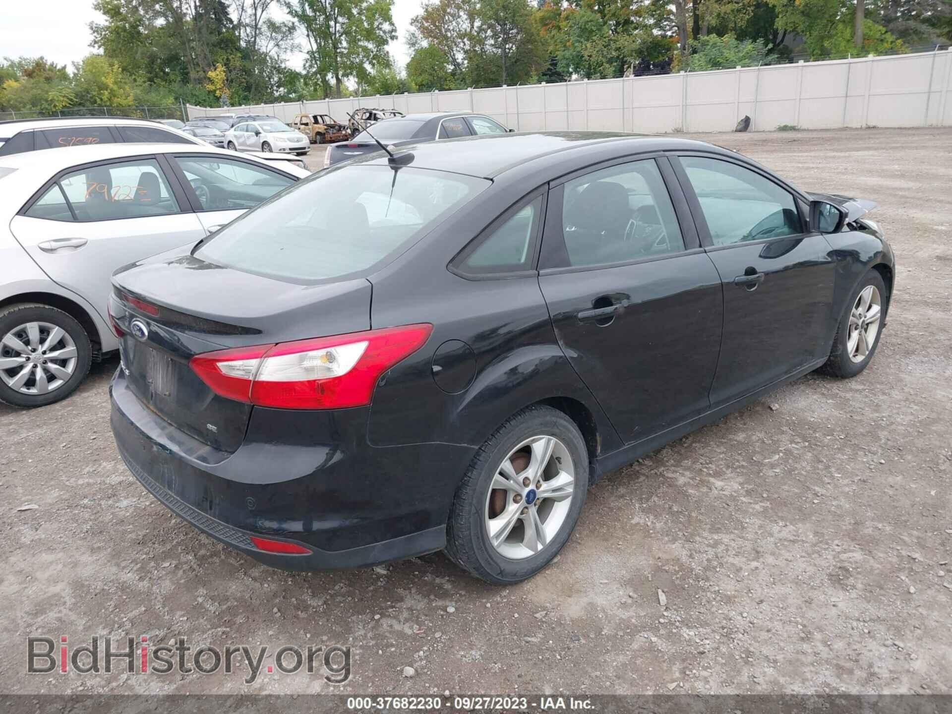 2014 FORD FOCUS - VIN: 1FADP3F20EL338369 - Photo 4