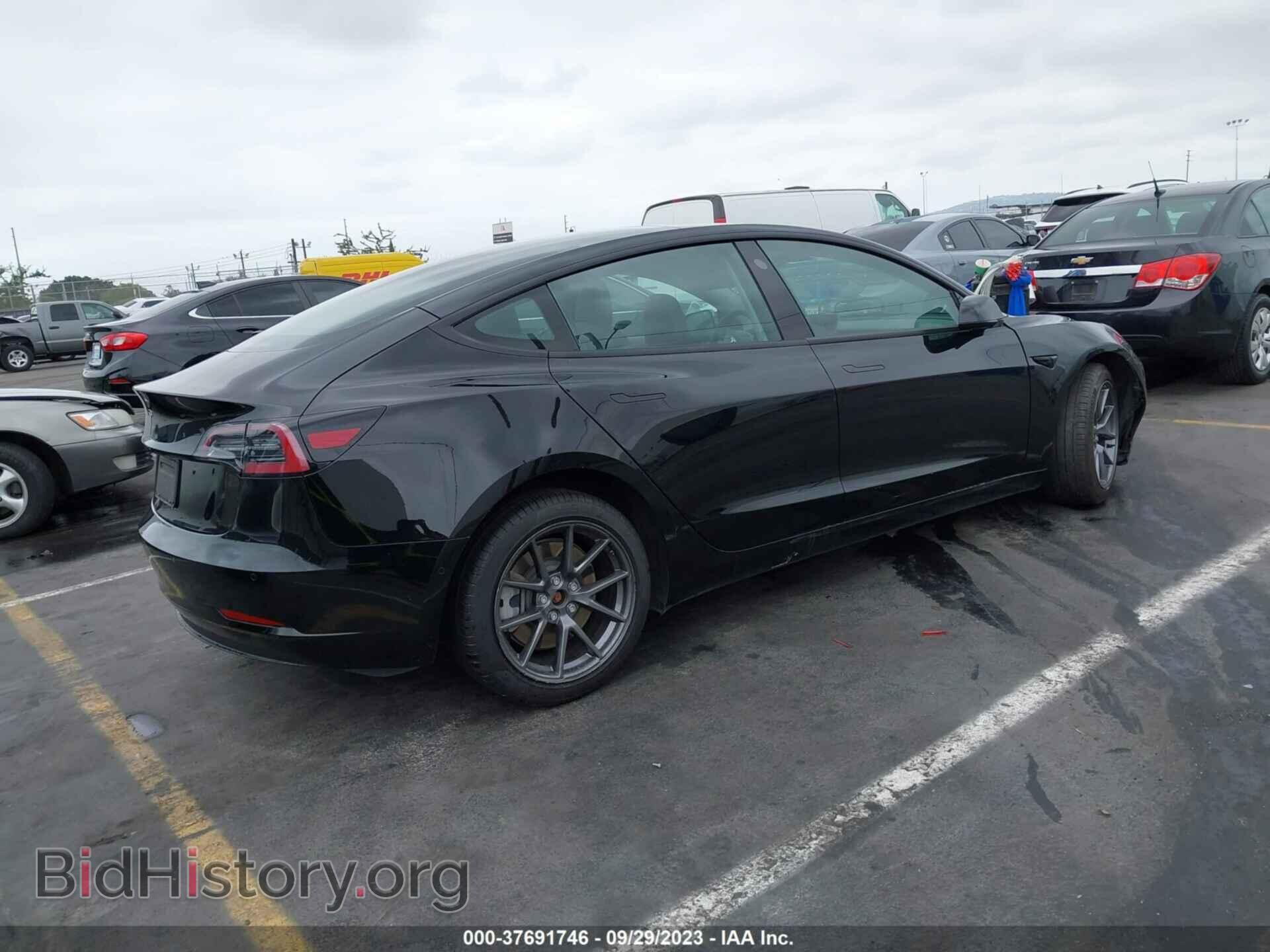 2021 TESLA MODEL 3 - VIN: 5YJ3E1EA0MF997742 - Фото 4