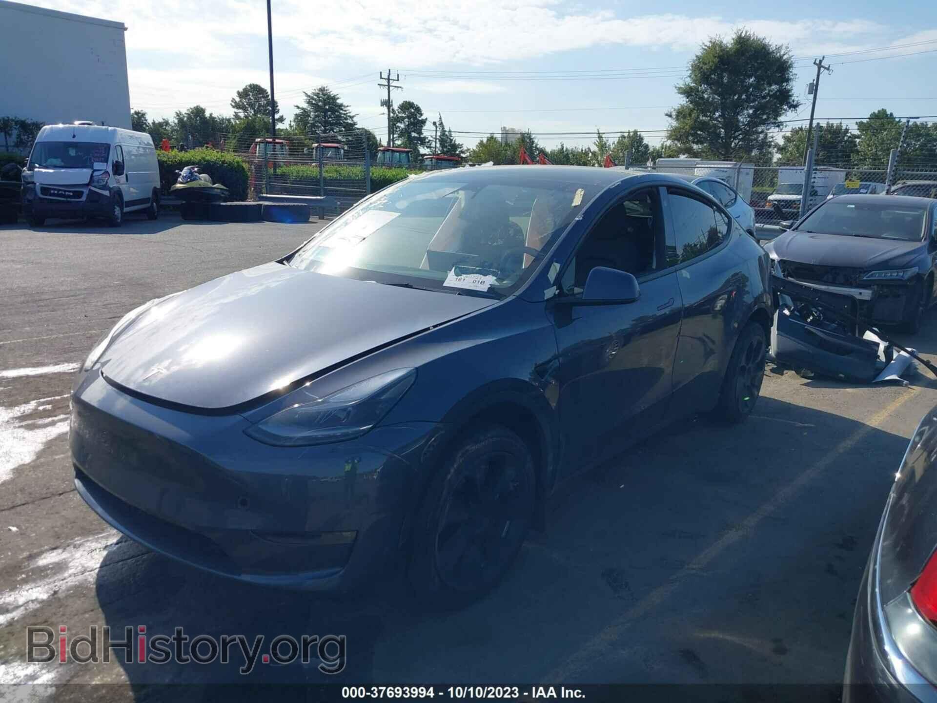 2023 TESLA MODEL Y - VIN: 7SAYGAEE8PF686358 - Фото 2