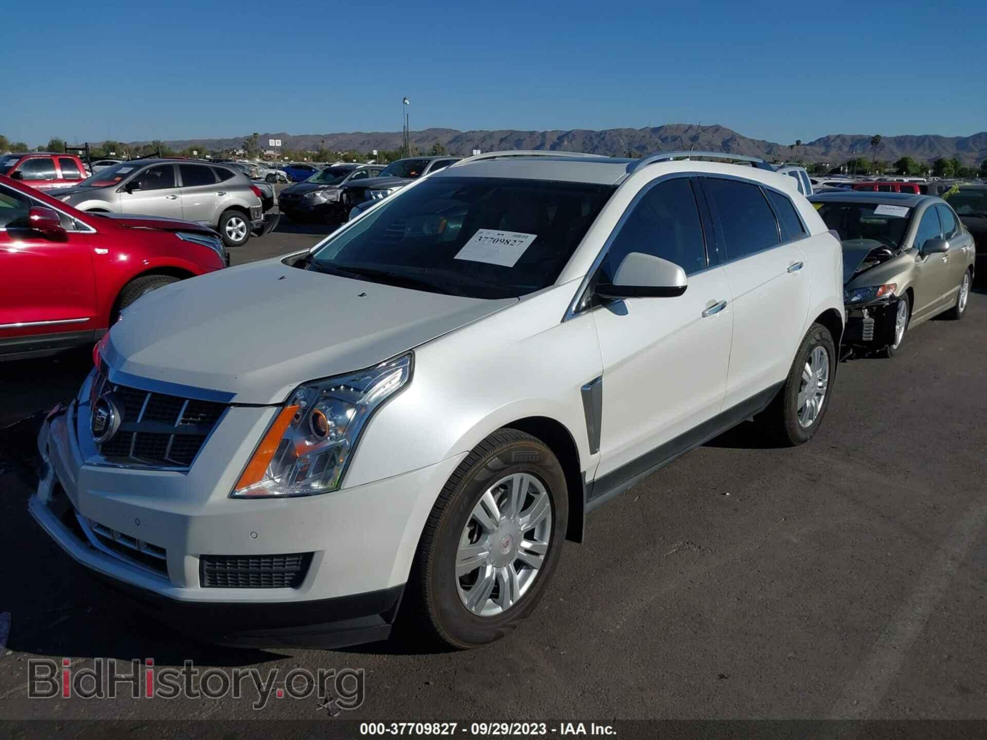 2014 CADILLAC SRX - VIN: 3GYFNBE30ES528089 - Фото 2