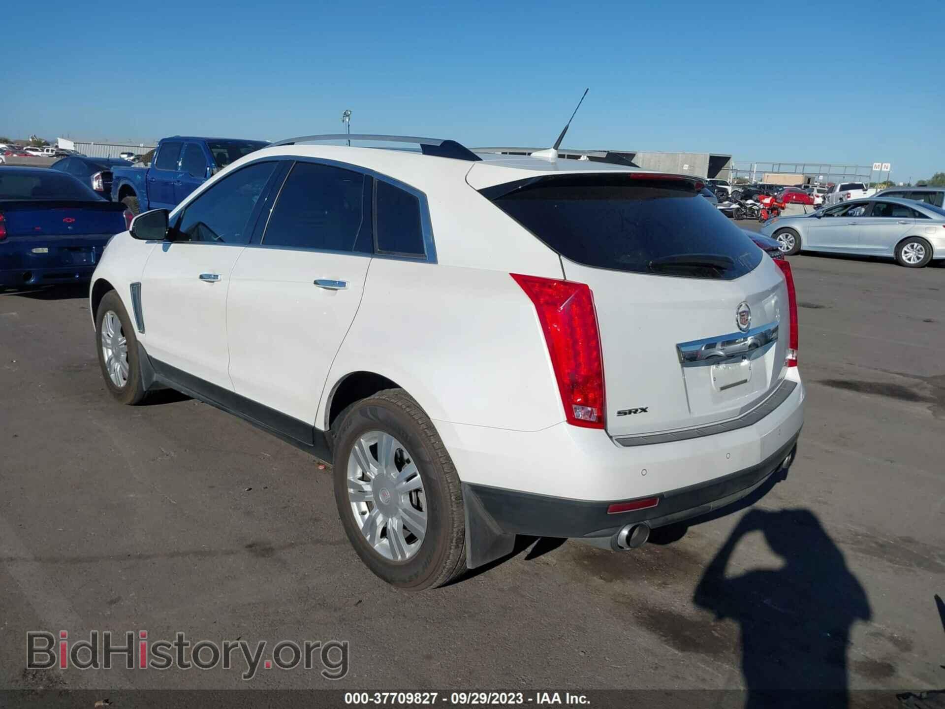 2014 CADILLAC SRX - VIN: 3GYFNBE30ES528089 - Фото 3
