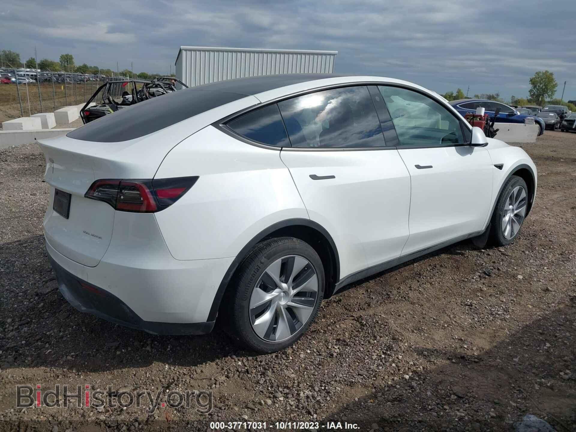 2022 TESLA MODEL Y - VIN: 7SAYGAEE2NF522570 - Photo 4