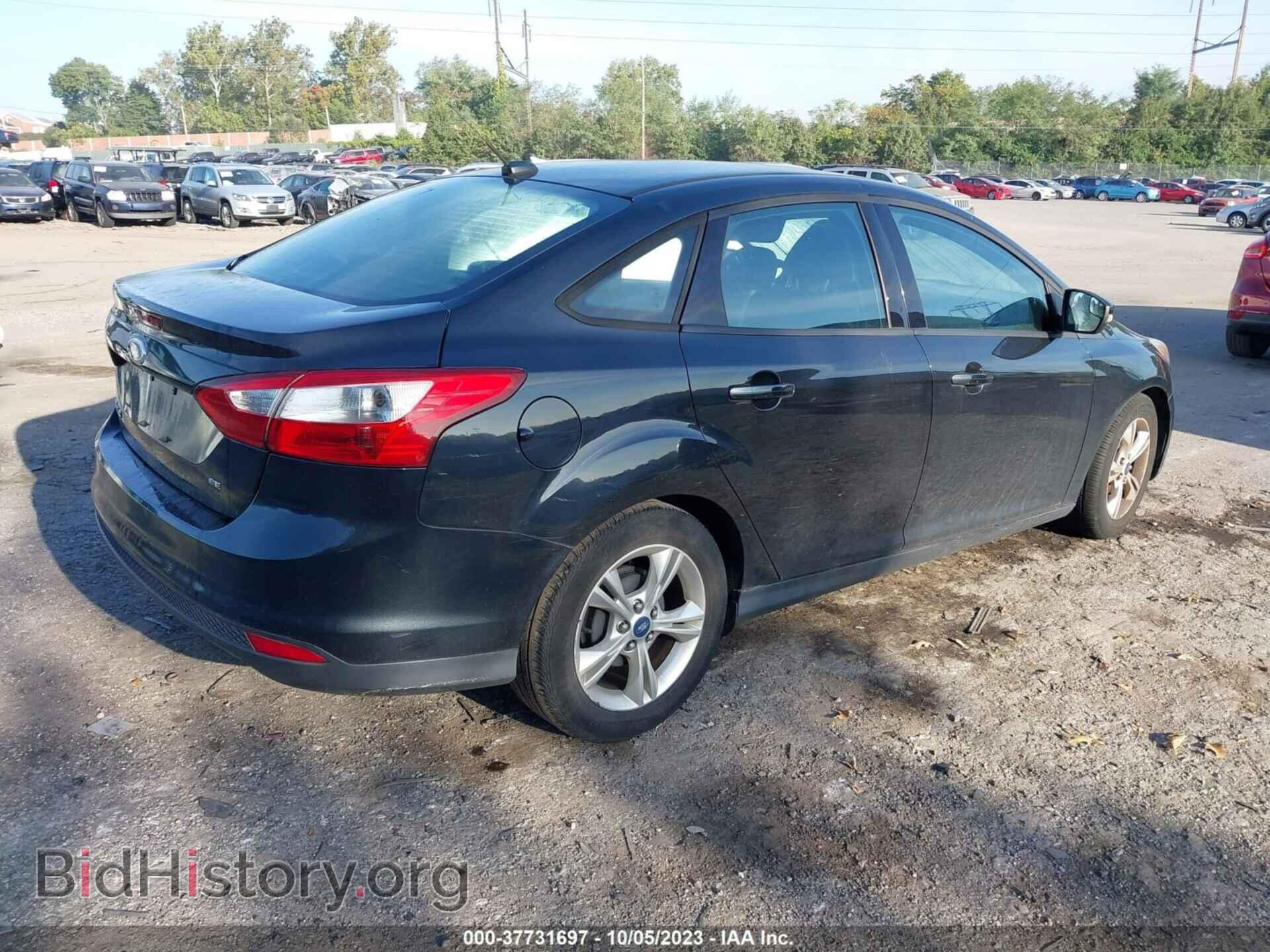 2014 FORD FOCUS - VIN: 1FADP3F20EL116267 - Photo 4