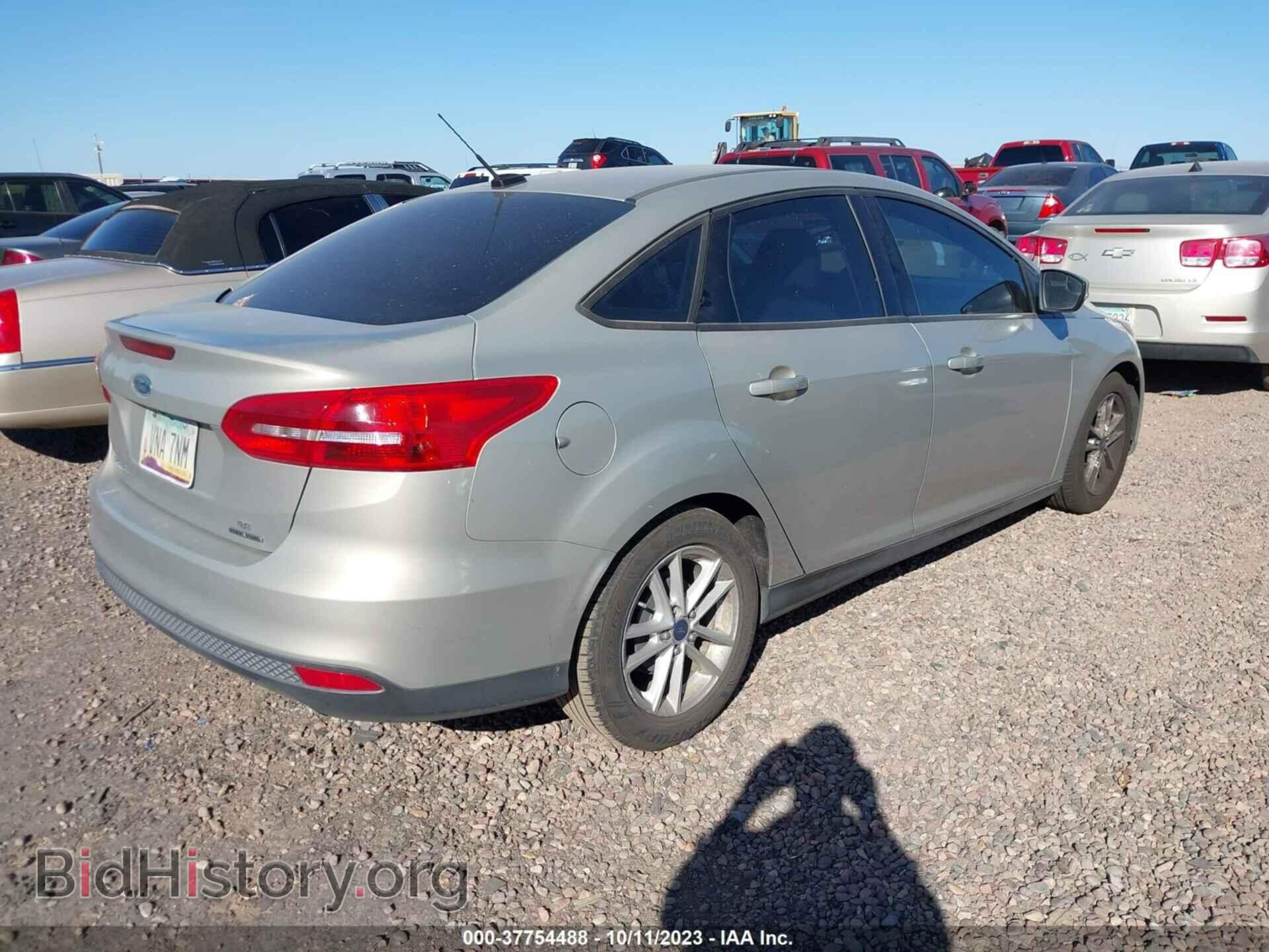 2015 FORD FOCUS - VIN: 1FADP3F20FL386004 - Photo 4