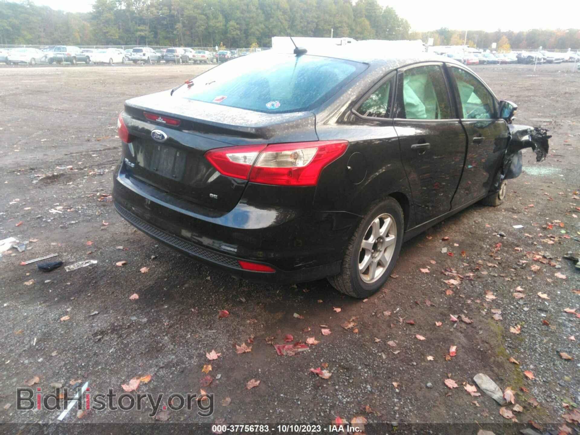 2014 FORD FOCUS - VIN: 1FADP3F28EL377694 - Photo 4
