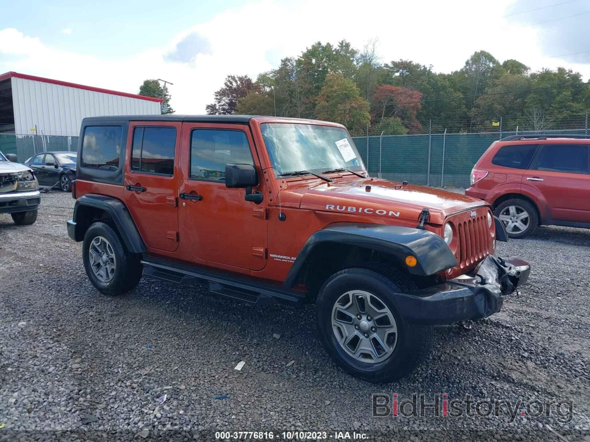 Фотография 1C4BJWFGXEL302835 - JEEP WRANGLER UNLIMITED 2014