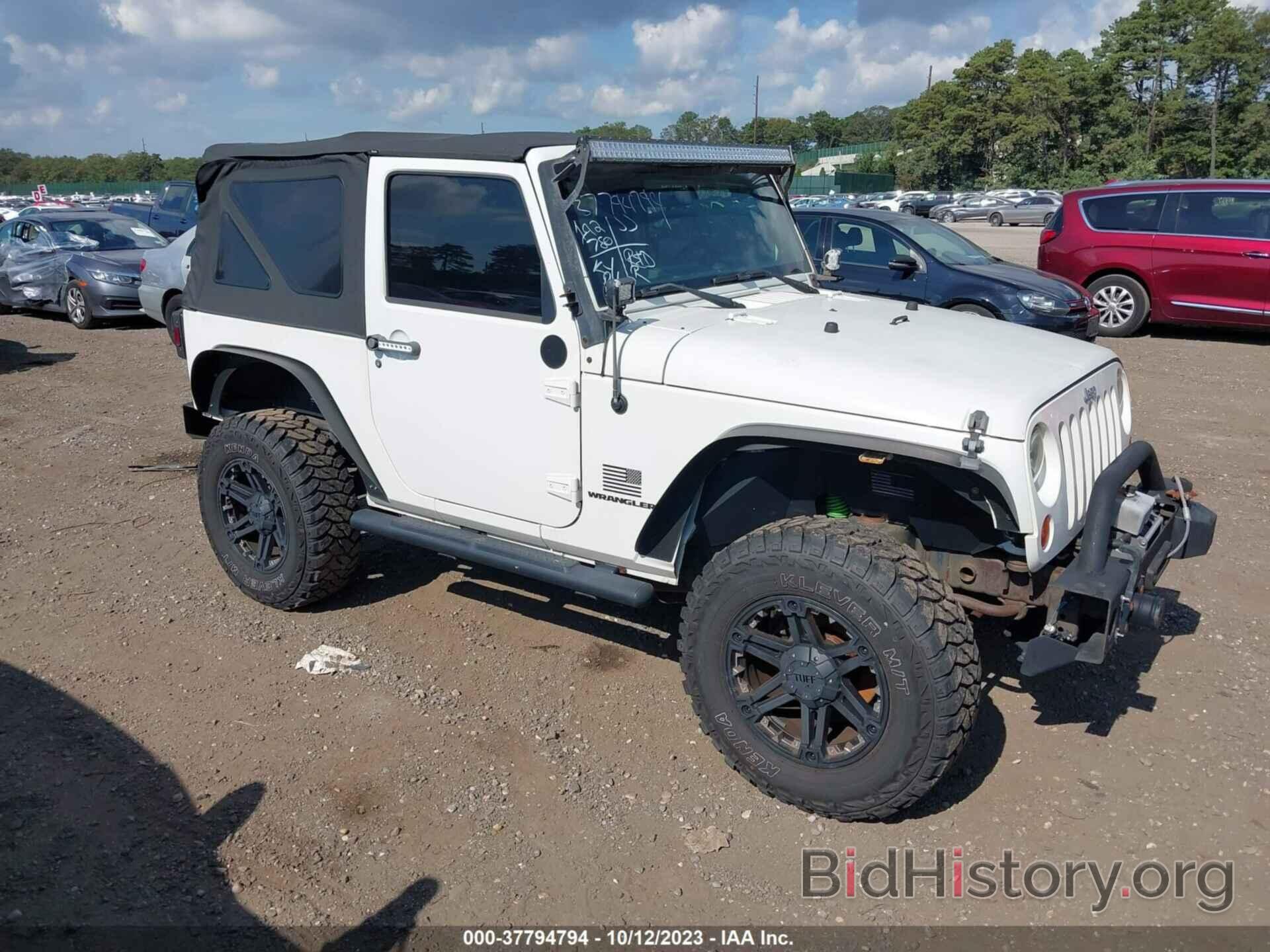 Photo 1J4FA241X9L748153 - JEEP WRANGLER 2009