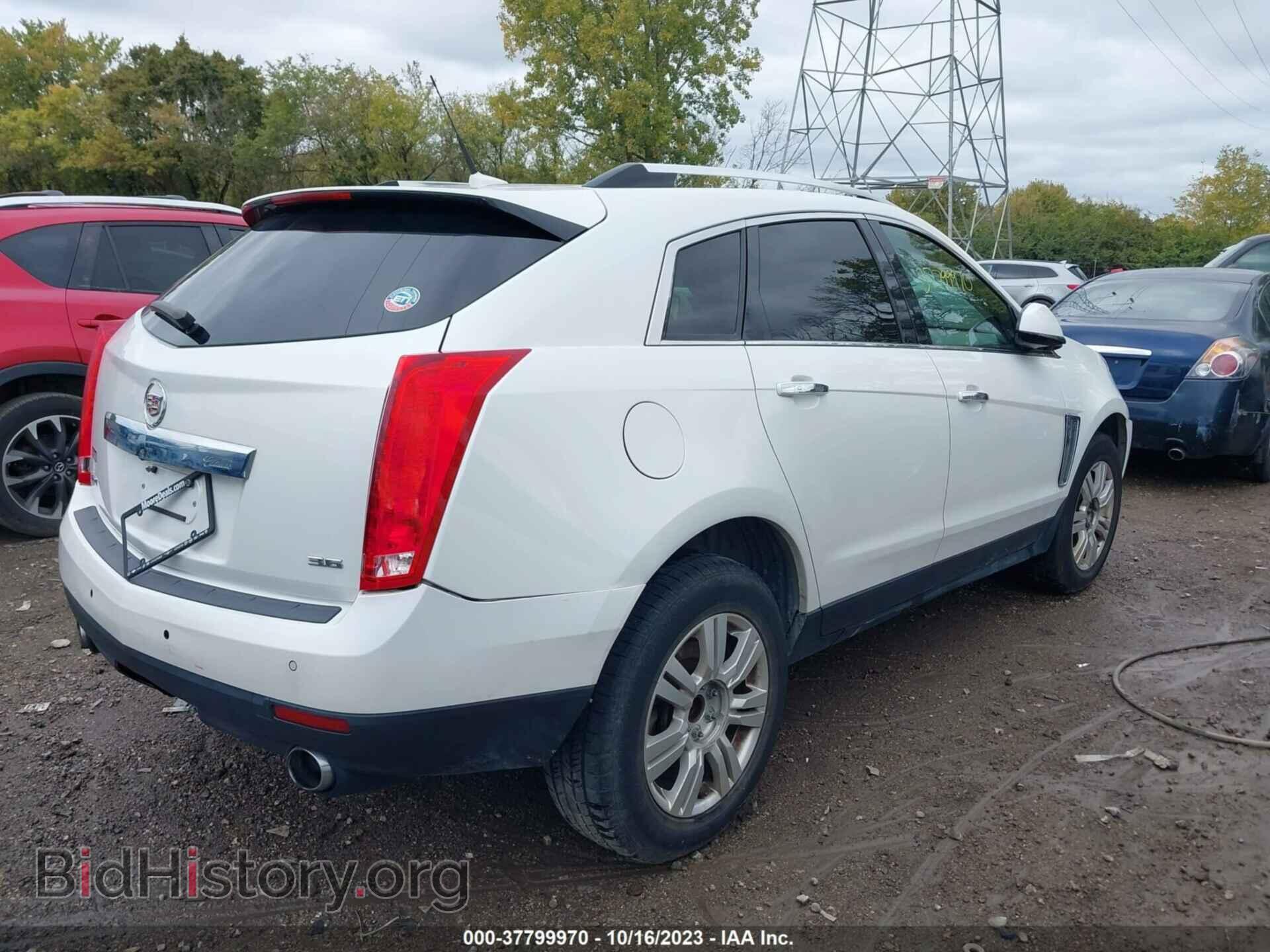 2014 CADILLAC SRX - VIN: 3GYFNBE3XES597923 - Фото 4