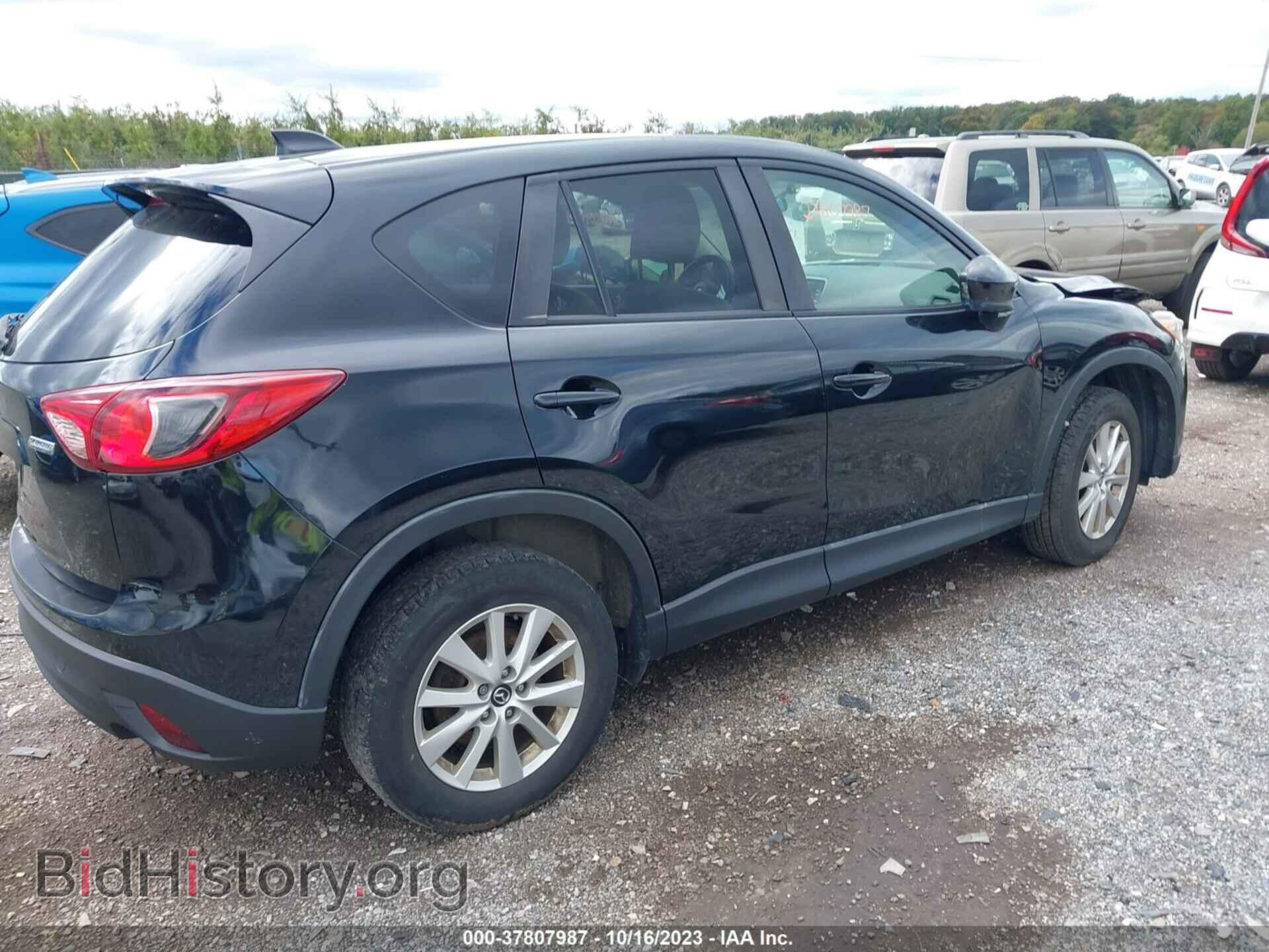 2014 MAZDA CX-5 - VIN: JM3KE4CY4E0372877 - Фото 4