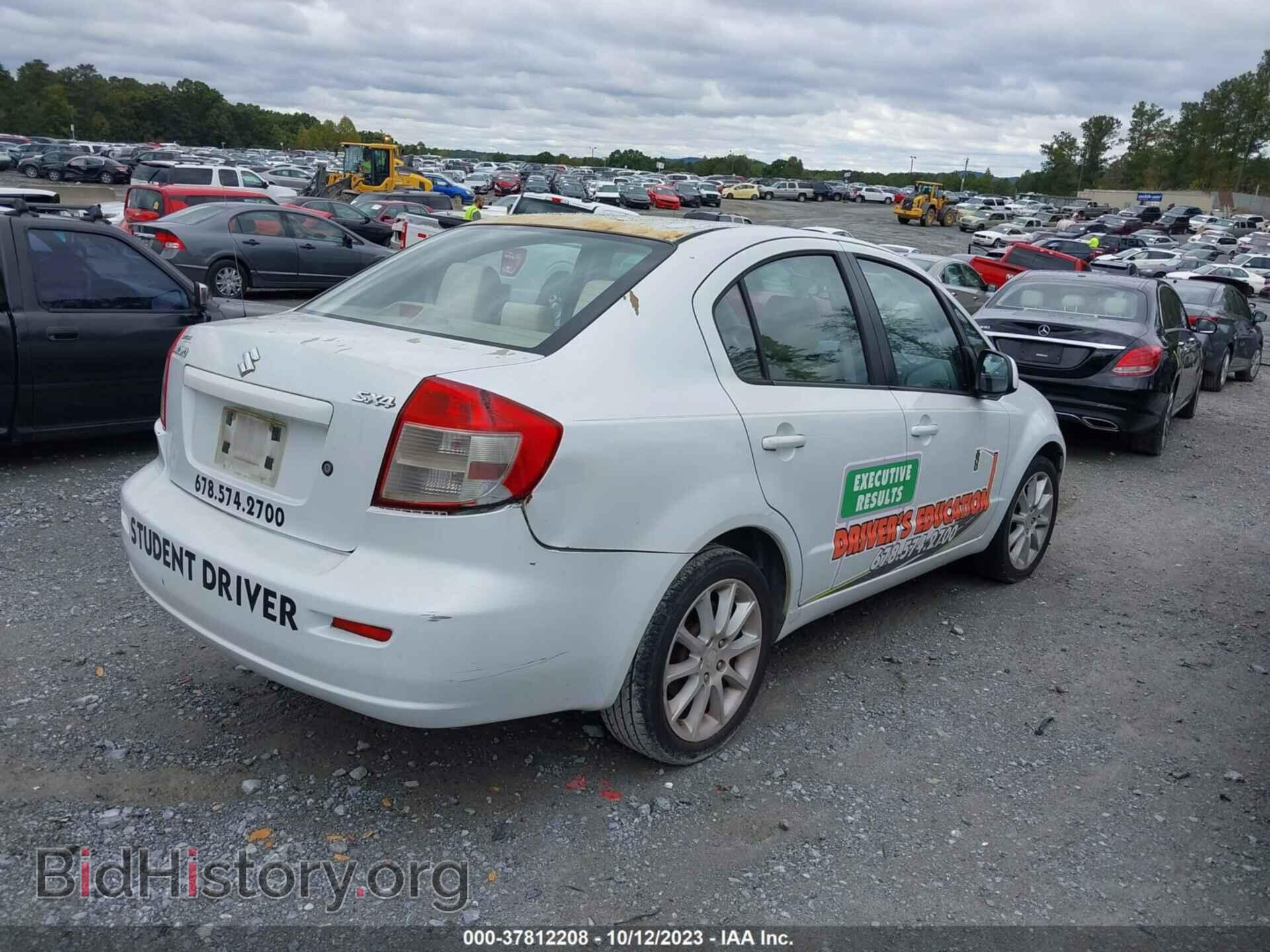 2011 SUZUKI SX4 - VIN: JS2YC5A29B6302772 - Photo 4