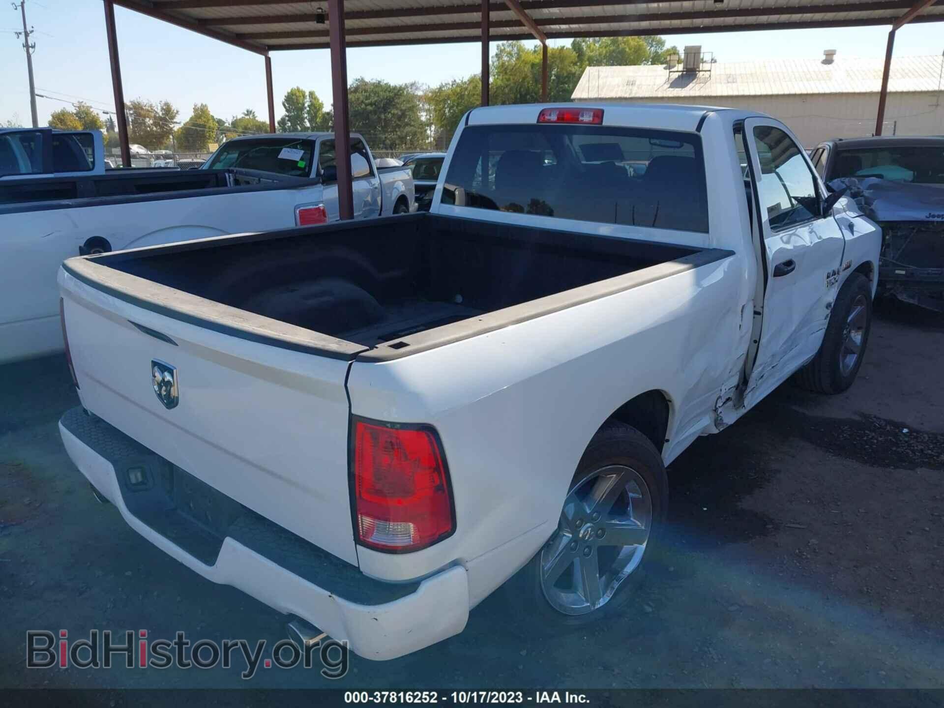 2014 RAM 1500 - VIN: 3C6JR6AT2EG103307 - Фото 4