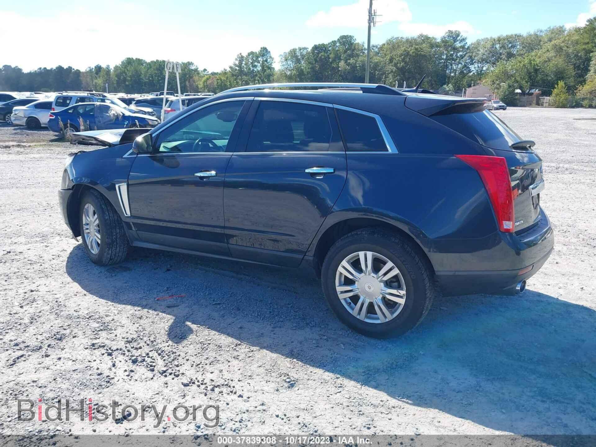2014 CADILLAC SRX - VIN: 3GYFNBE30ES665971 - Фото 3