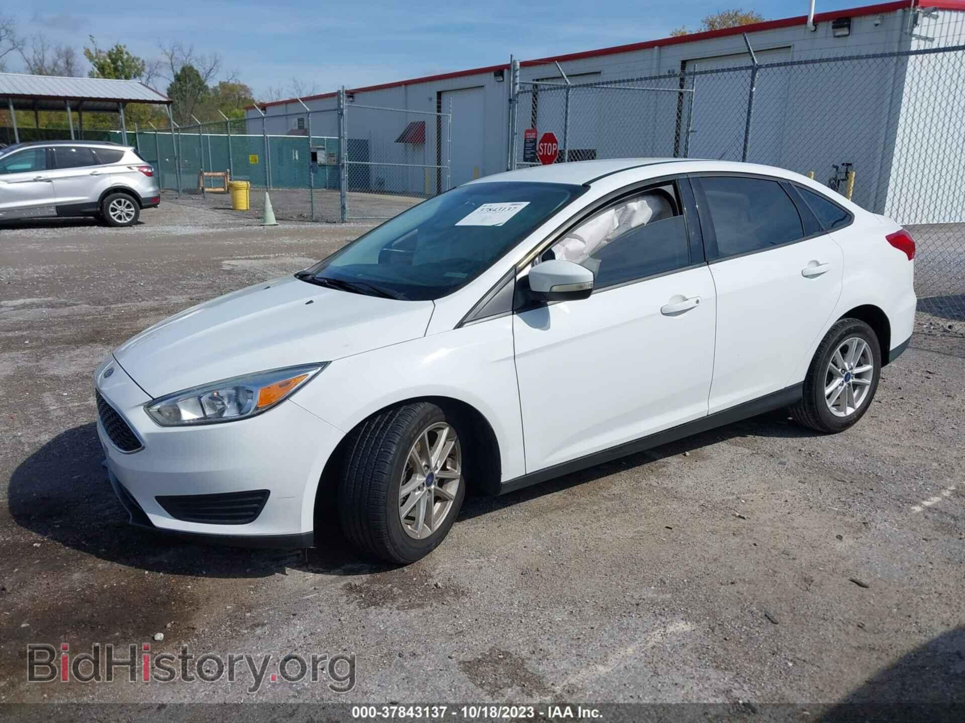 2016 FORD FOCUS - VIN: 1FADP3F21GL288472 - Фото 2