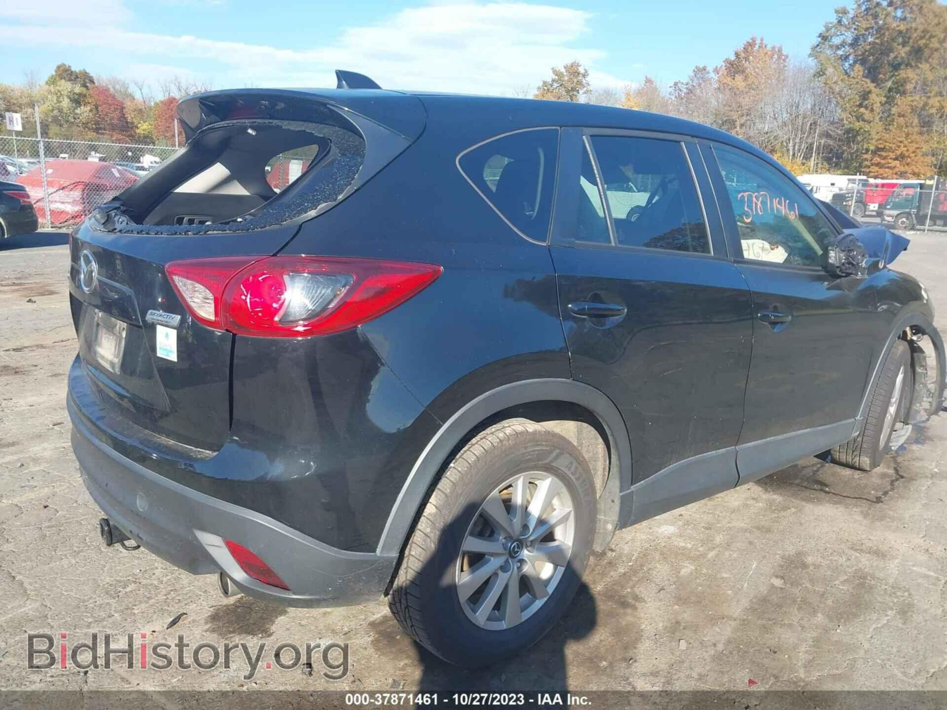 2015 MAZDA CX-5 - VIN: JM3KE2CY9F0488078 - Фото 4
