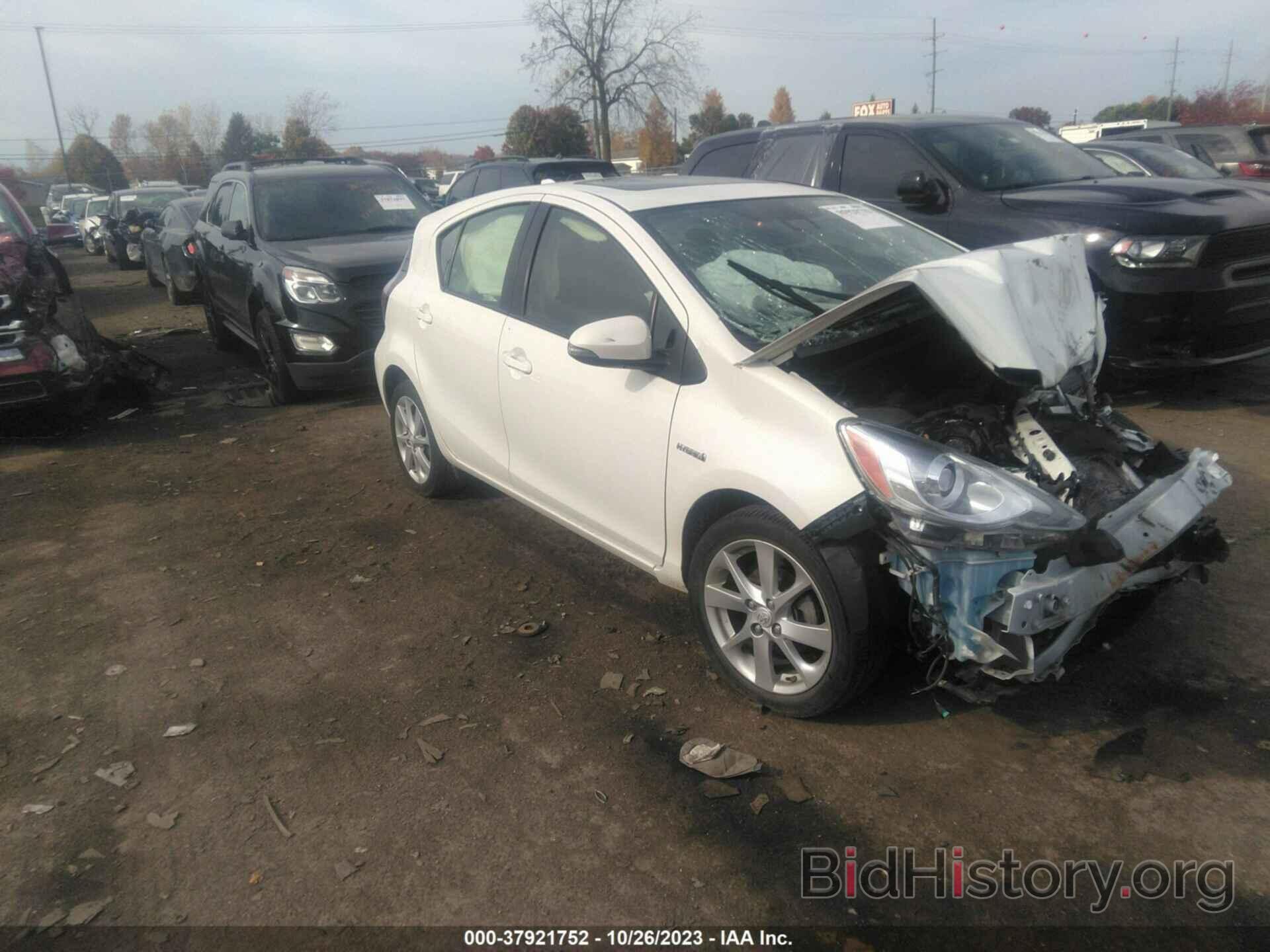 Фотография JTDKDTB36G1123036 - TOYOTA PRIUS C 2016