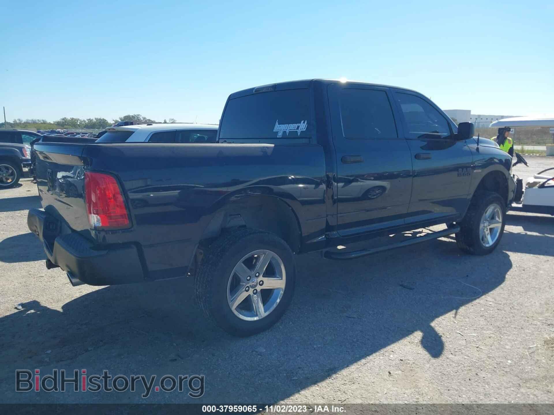 2014 RAM 1500 - VIN: 3C6RR6KT4EG219805 - Photo 4