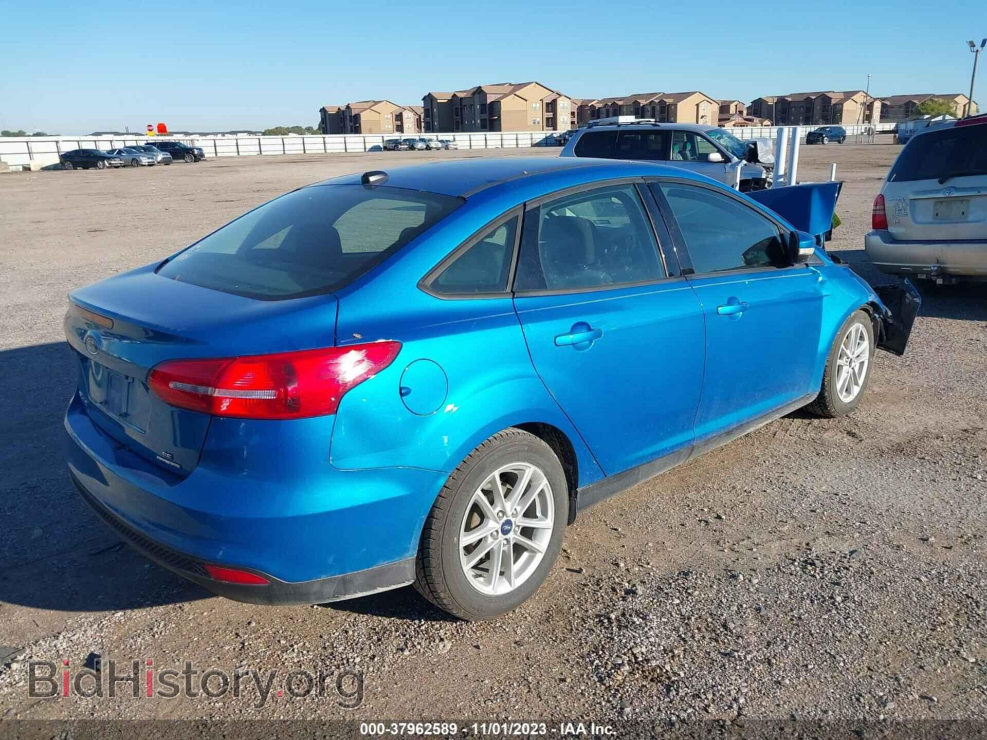 2015 FORD FOCUS - VIN: 1FADP3F20FL240590 - Photo 4