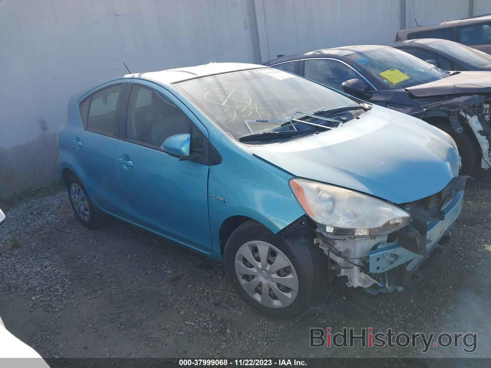 Фотография JTDKDTB3XD1041418 - TOYOTA PRIUS C 2013