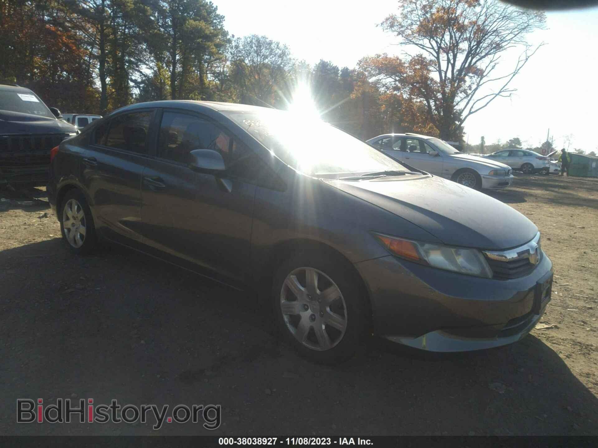 Фотография 19XFB2F90CE308027 - HONDA CIVIC SDN 2012