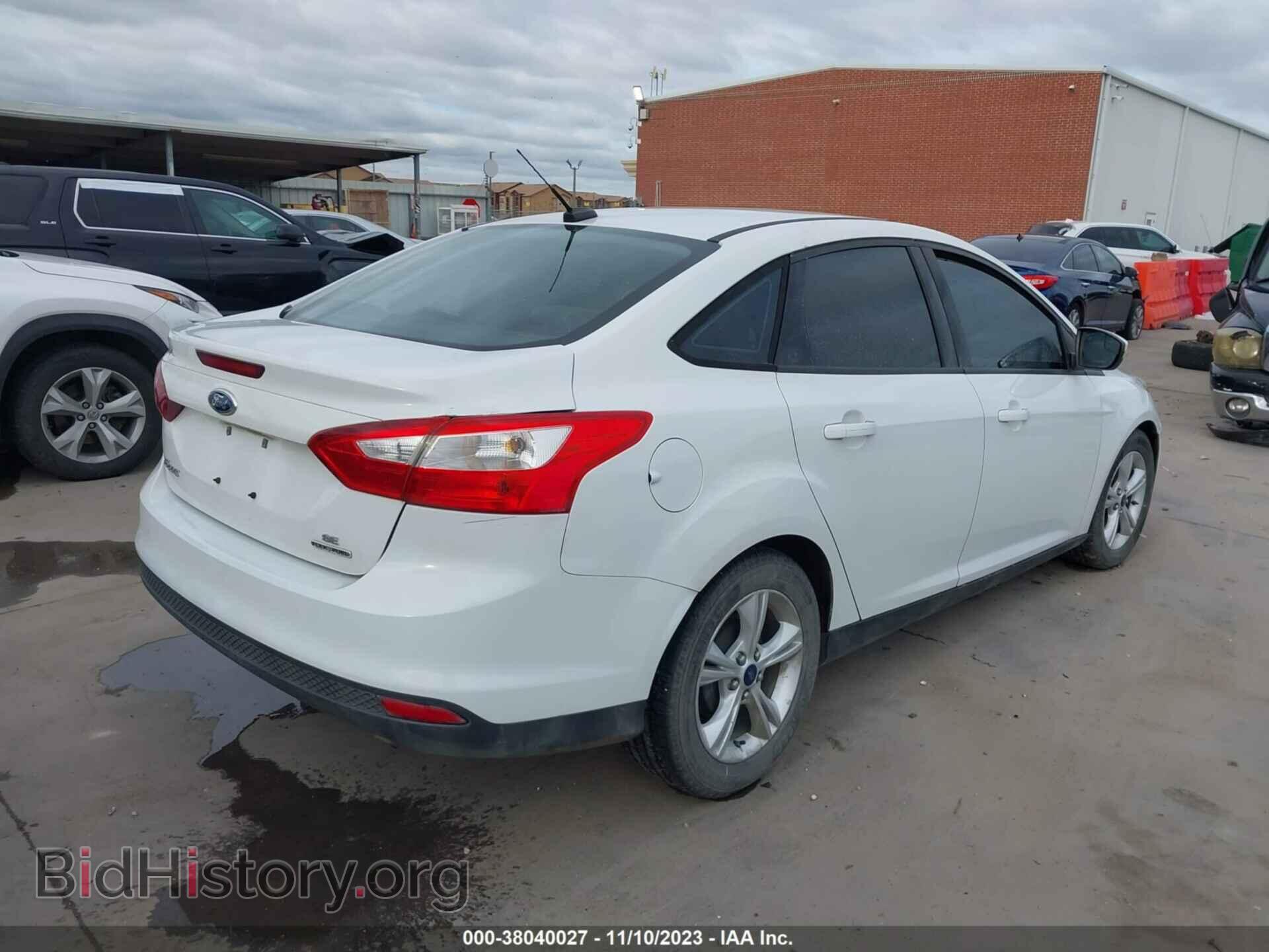 2014 FORD FOCUS - VIN: 1FADP3F20EL406136 - Photo 4