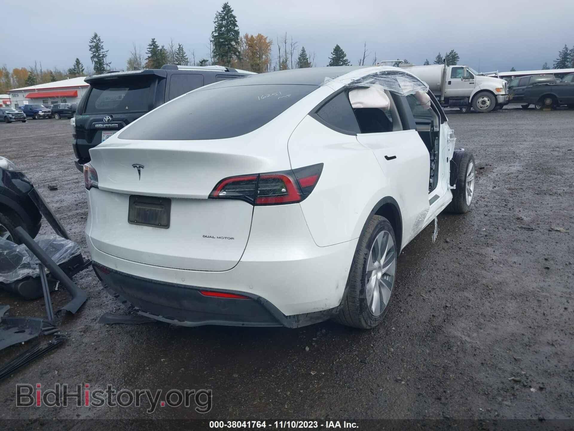 2022 TESLA MODEL Y - VIN: 7SAYGAEE6NF404442 - Фото 4